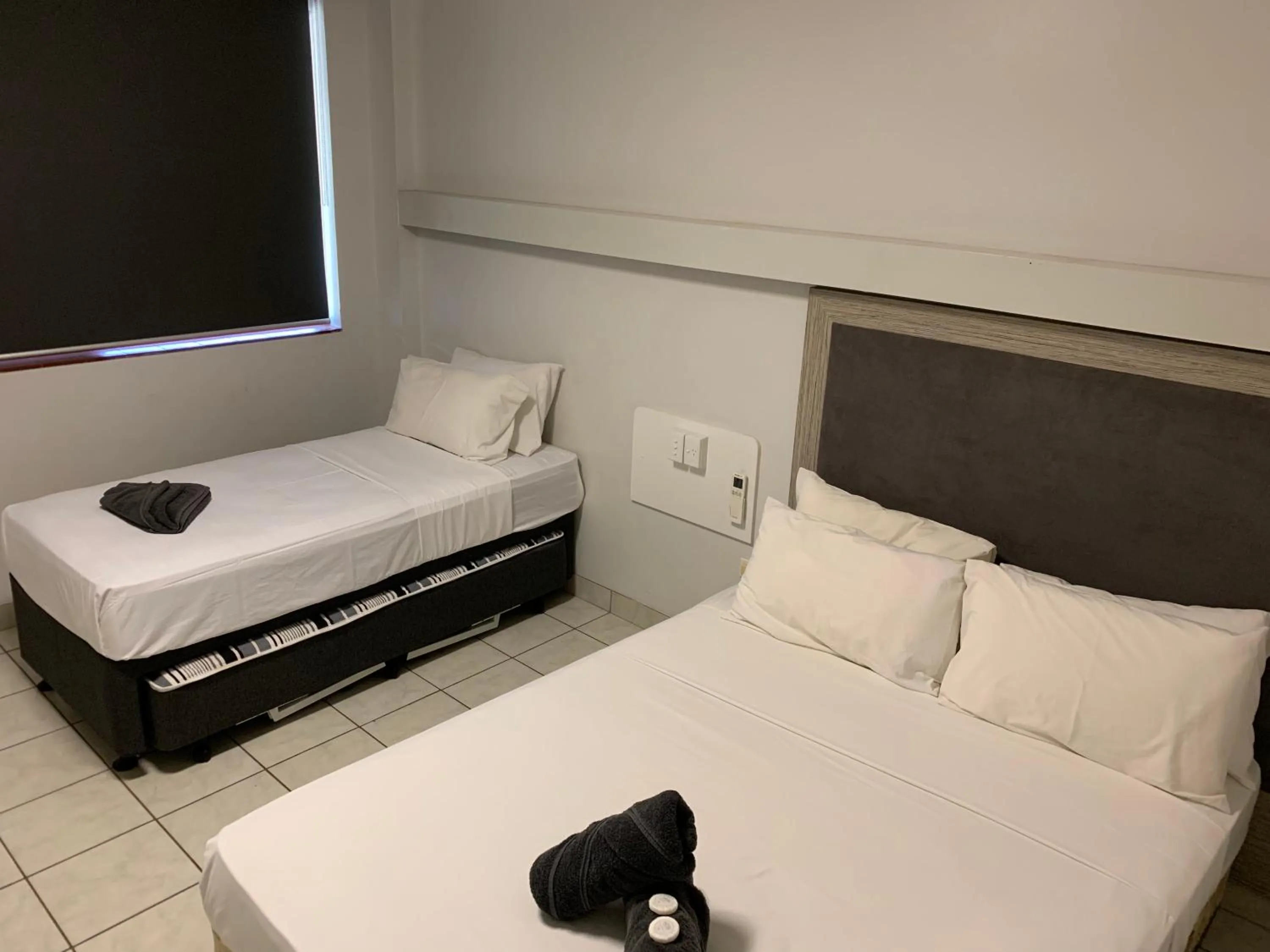 Bed in The Stuart Hotel-Motel