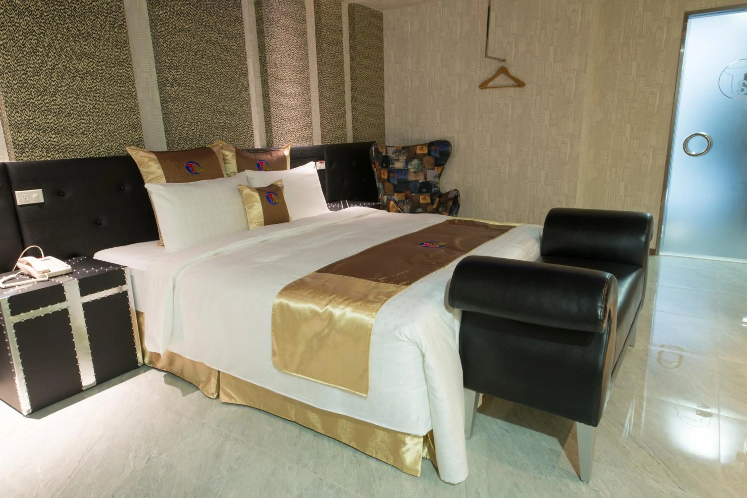 Bed in Ting-Shuai Motel