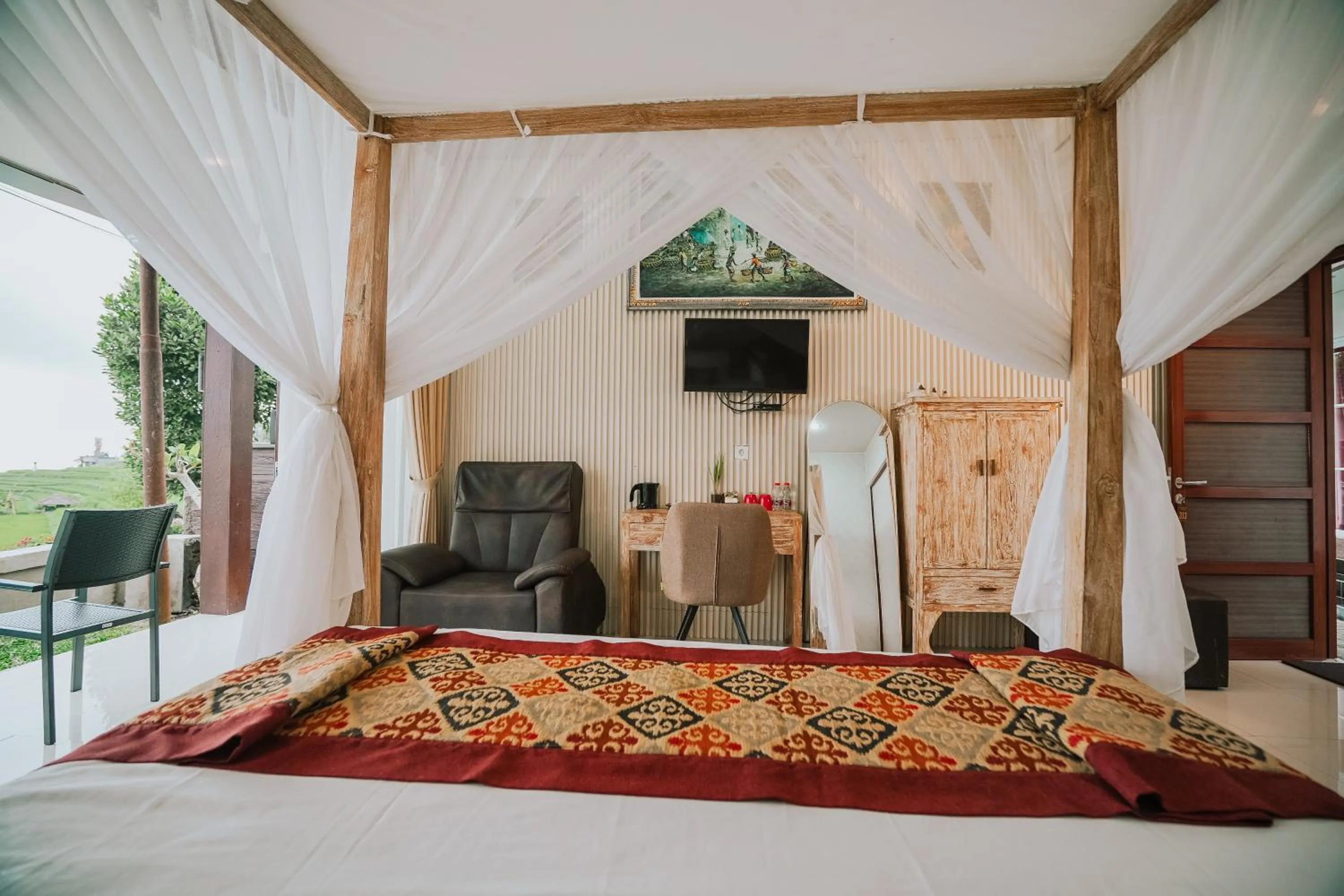 TV and multimedia, Bed in Bhuana Agung Villa and Restaurant