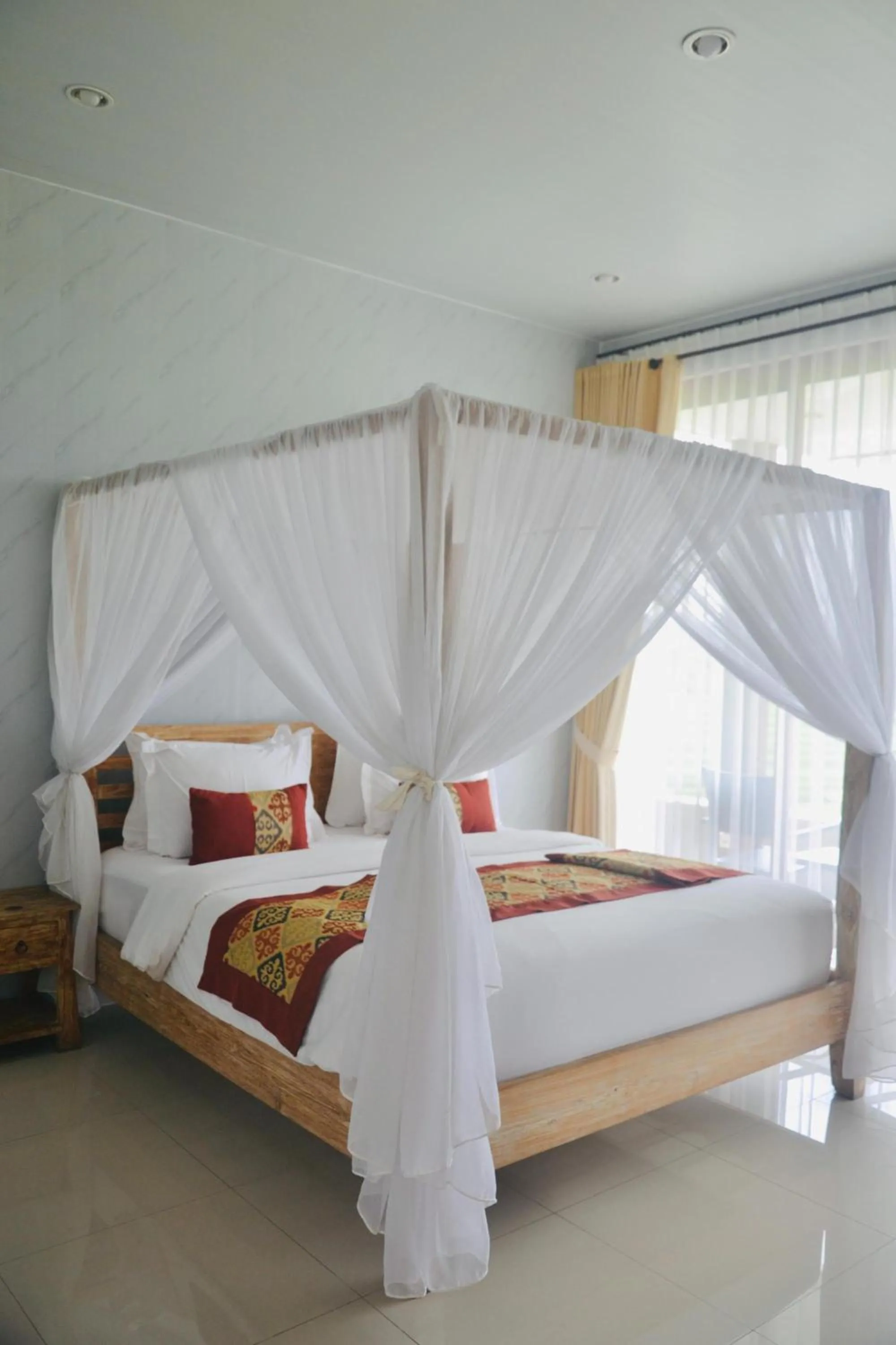 Bed in Bhuana Agung Villa and Restaurant