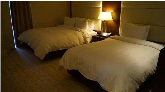 Photo of the whole room, Bed in Ramada Plaza by Wyndham Gwangju