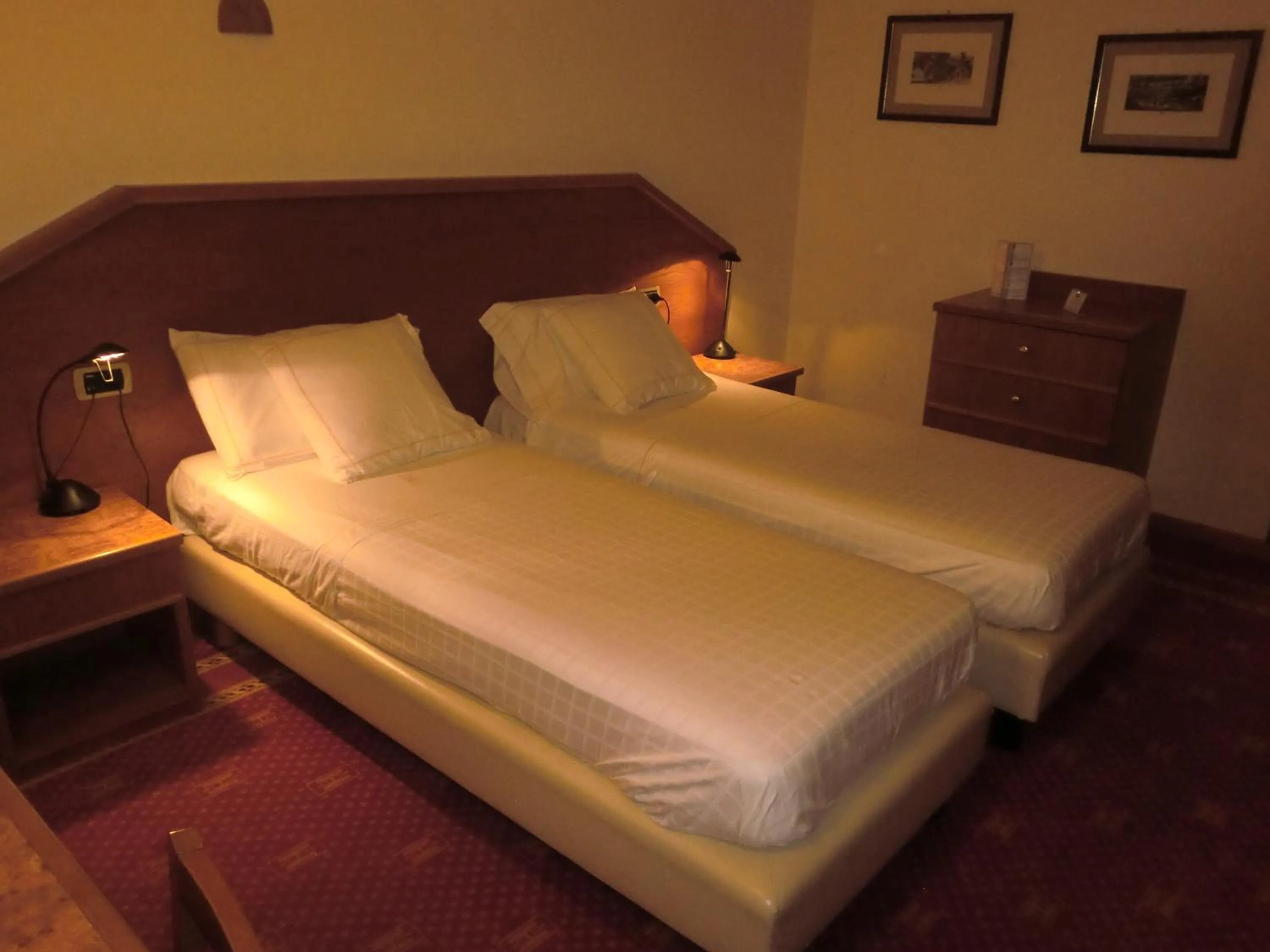 Bed in Hotel Ariston