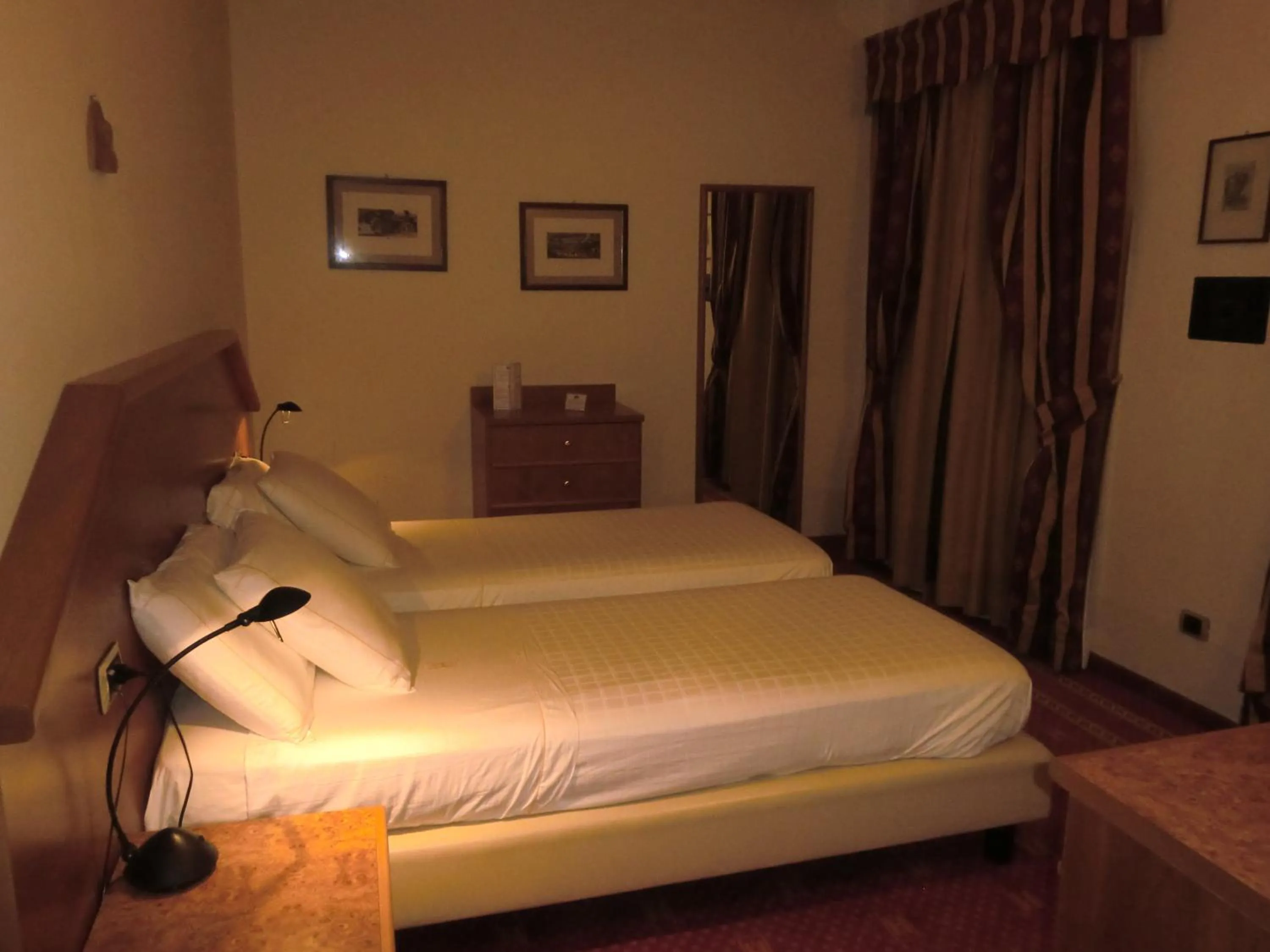 Bed in Hotel Ariston