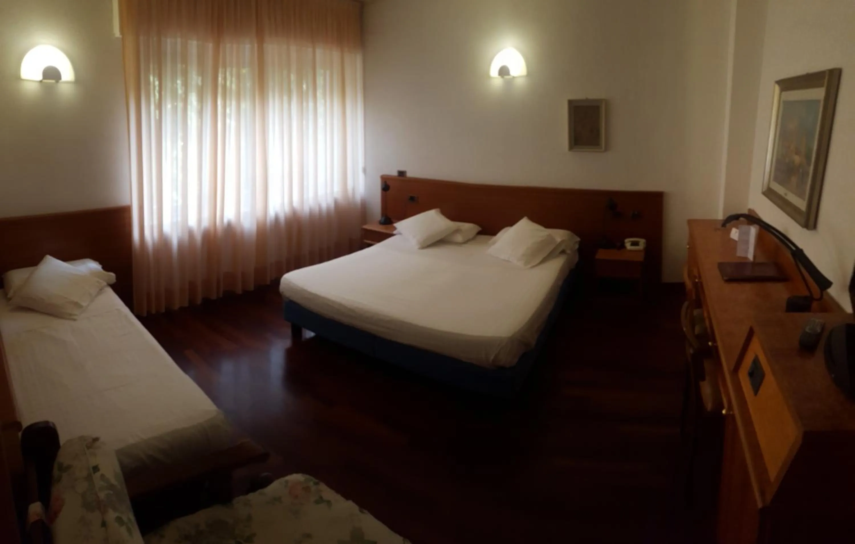 Bed in Hotel Ariston