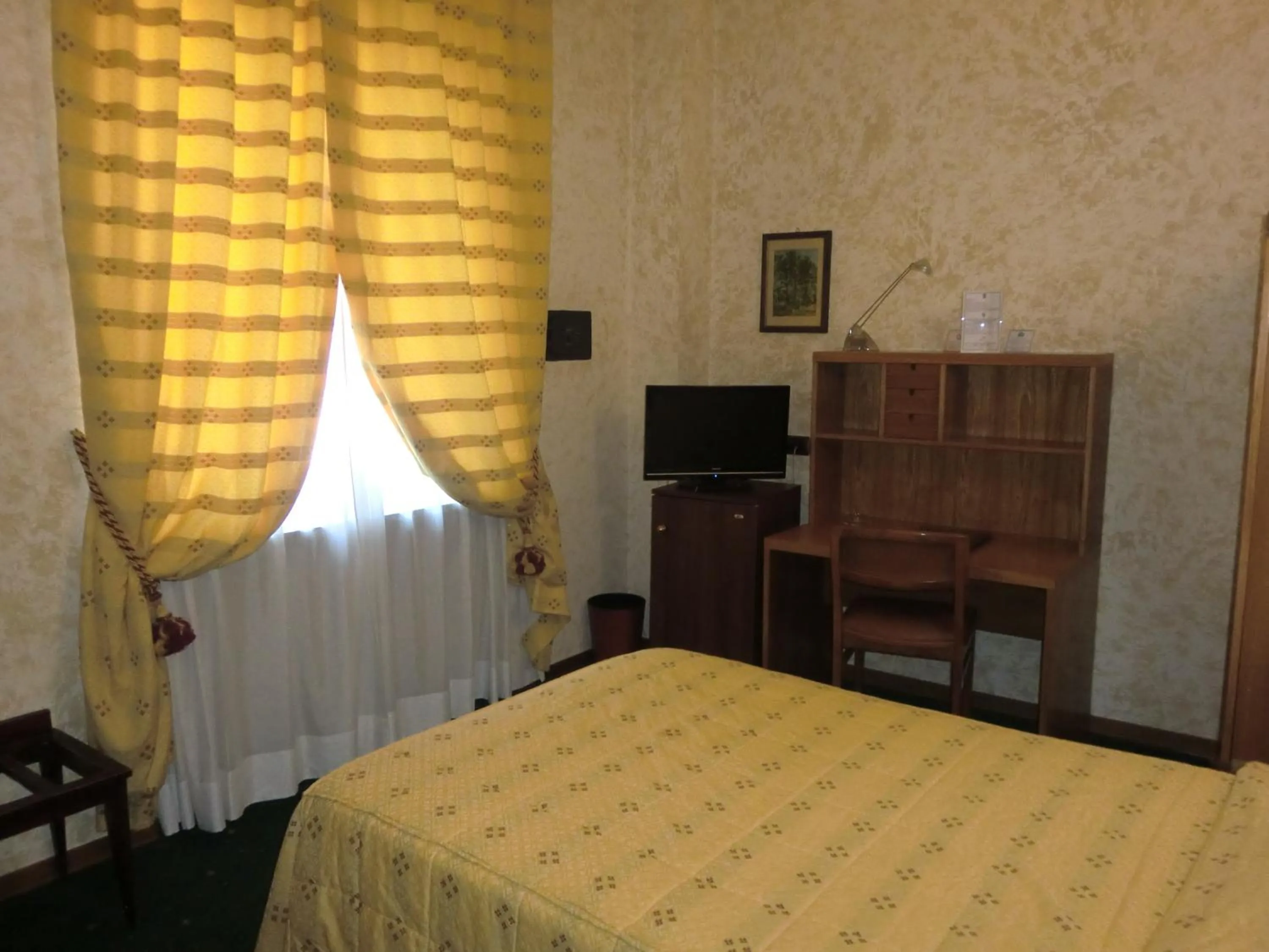 Bed in Hotel Ariston