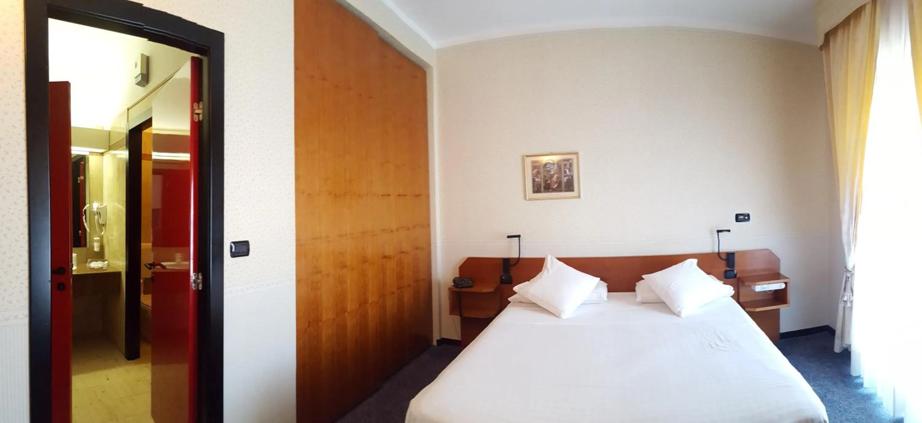 Bed in Hotel Ariston