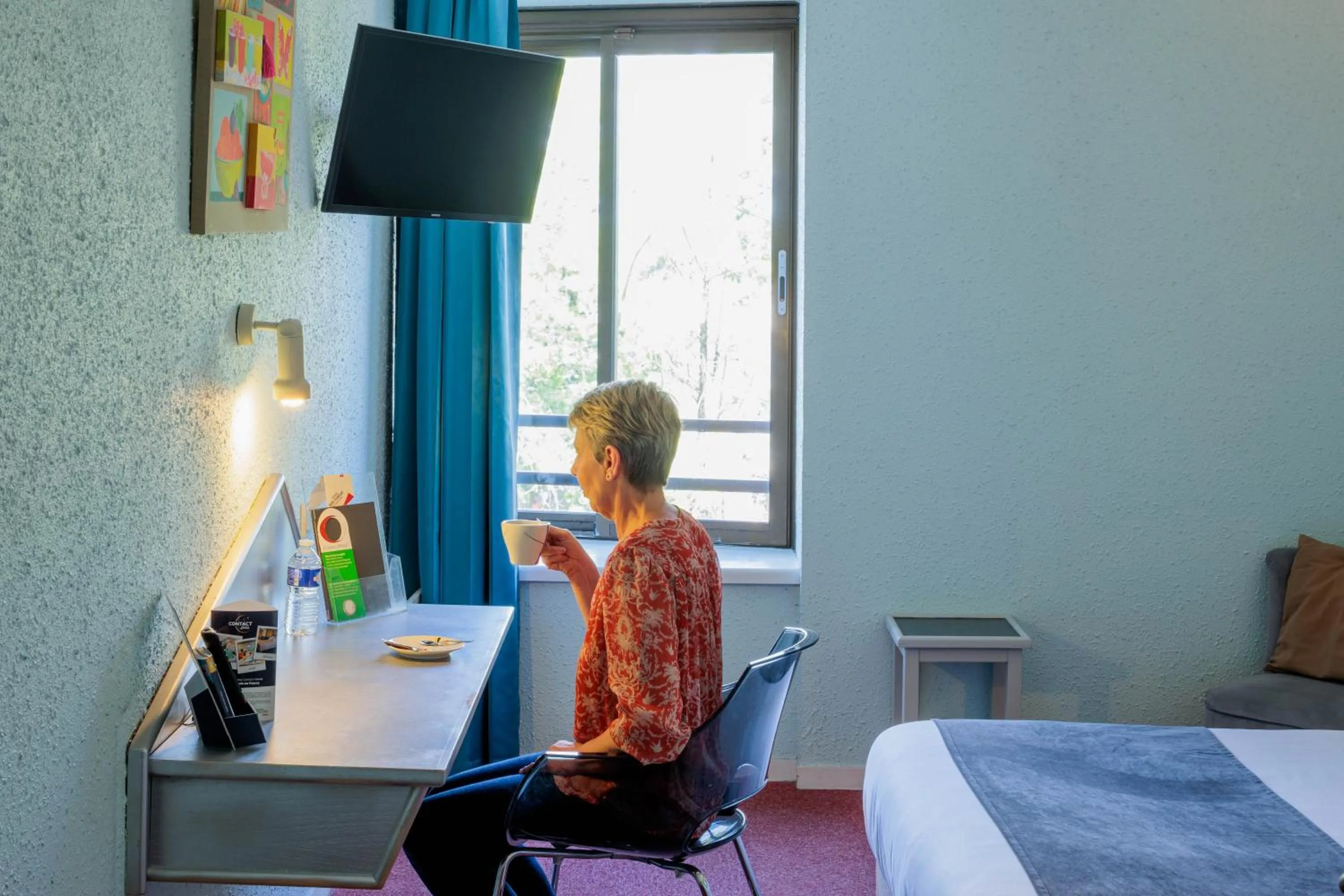 Bedroom in Logis Hotel Noemys Brive - Restaurant Le Teinchurier