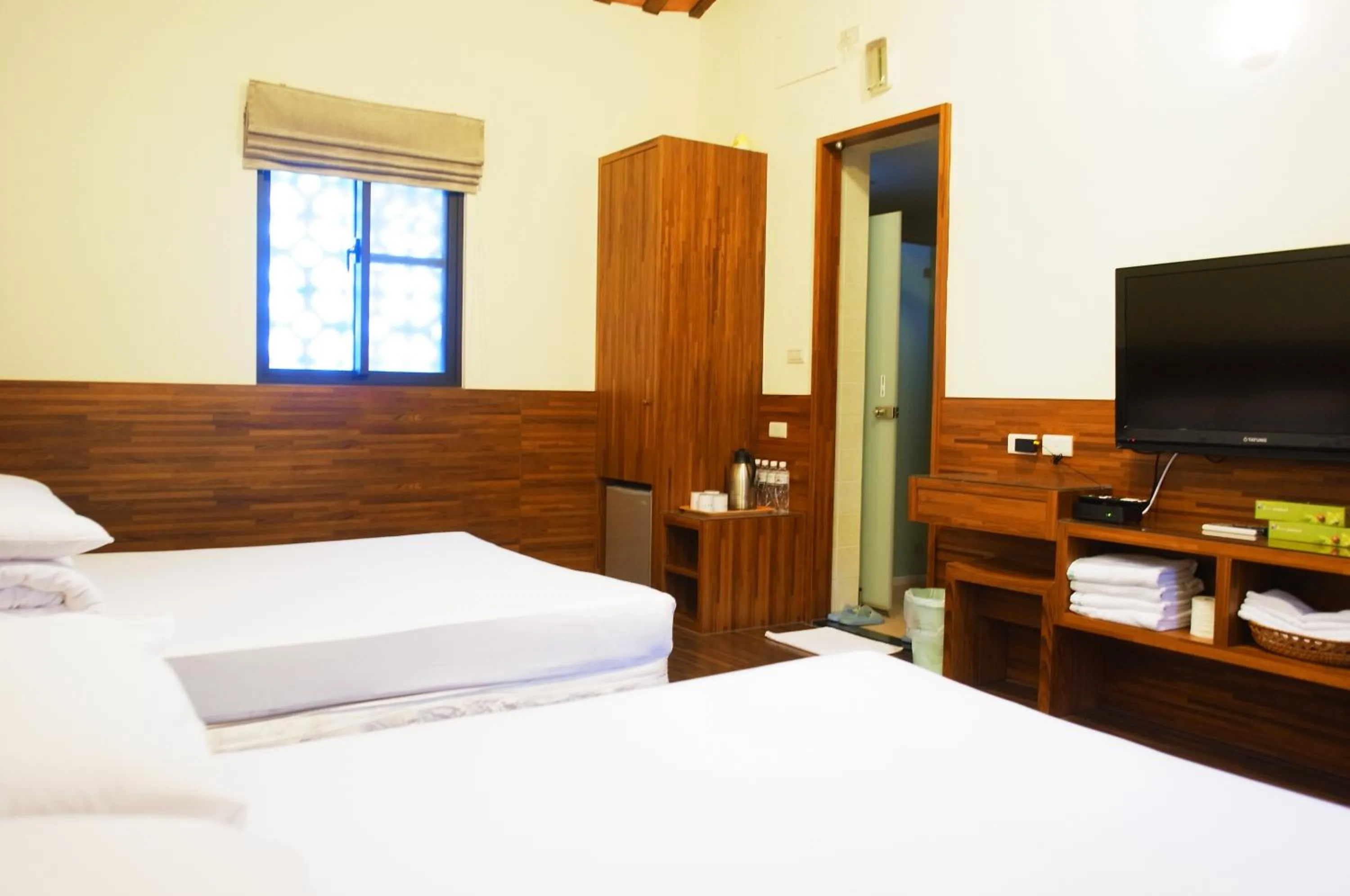 Photo of the whole room, Bed in Kenting Youth Activity Center