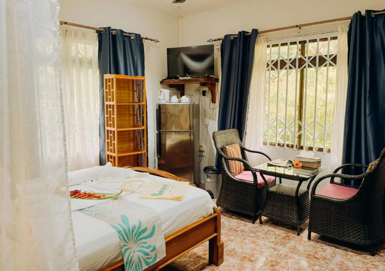 Seating area, Bed in Buisson Guesthouse