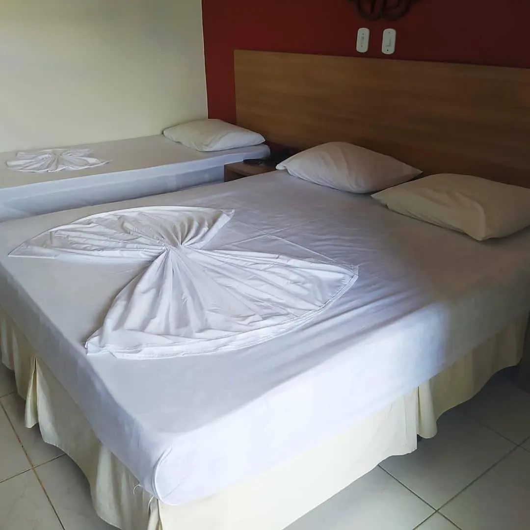 Bed in Tropical Praia Hotel