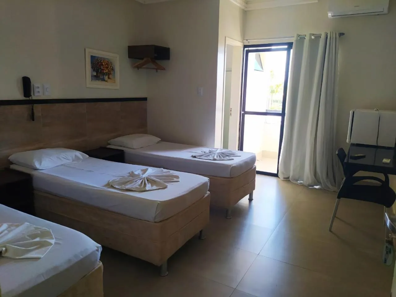 Bed in Tropical Praia Hotel