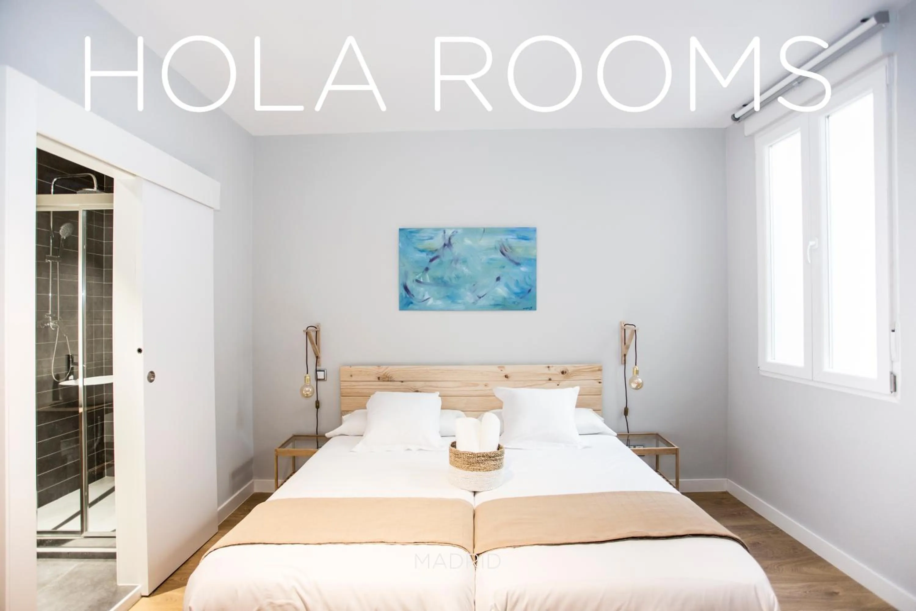 Bed in Hola Rooms