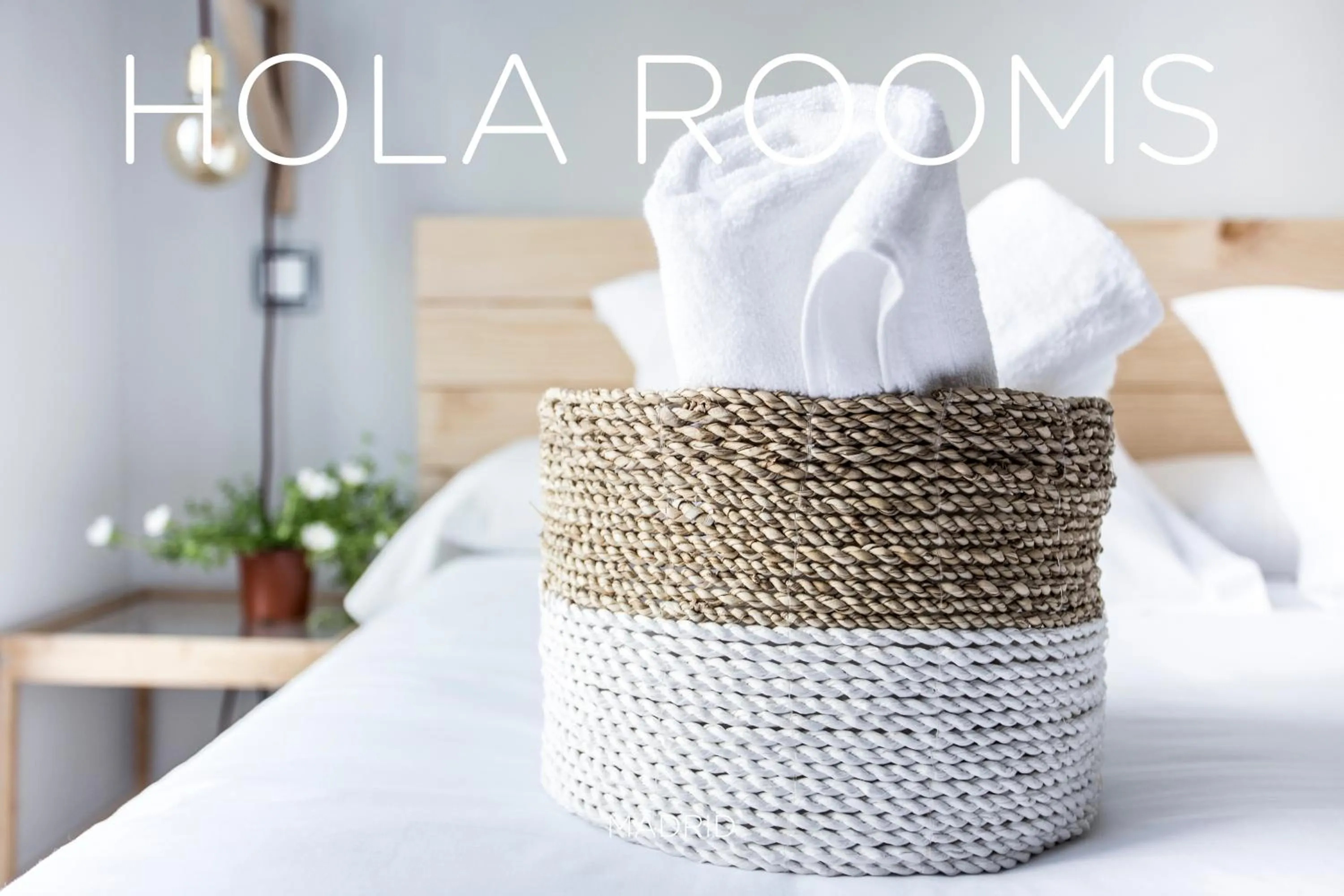 Bed in Hola Rooms