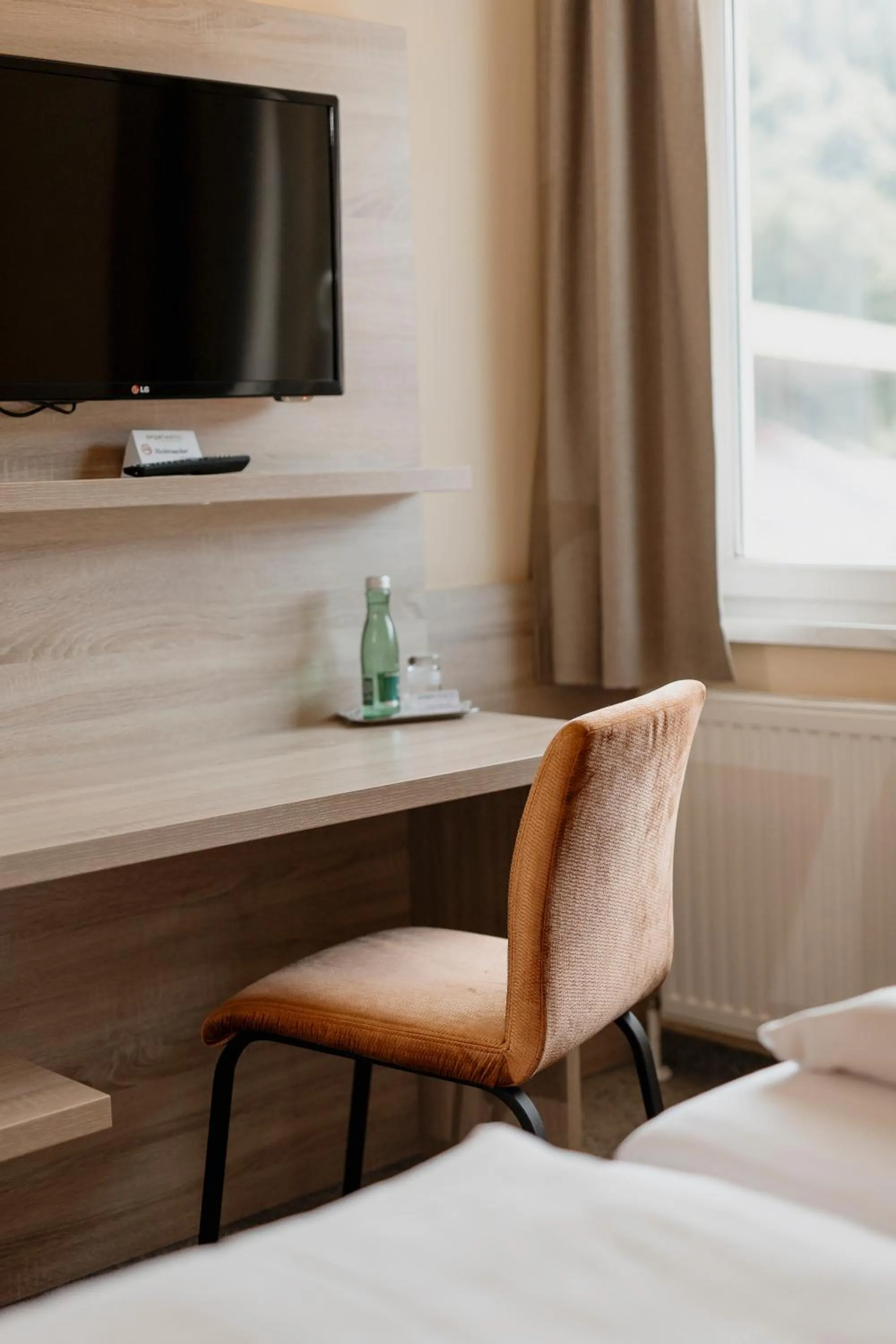 Photo of the whole room, Bed in Sporthotel Kapfenberg