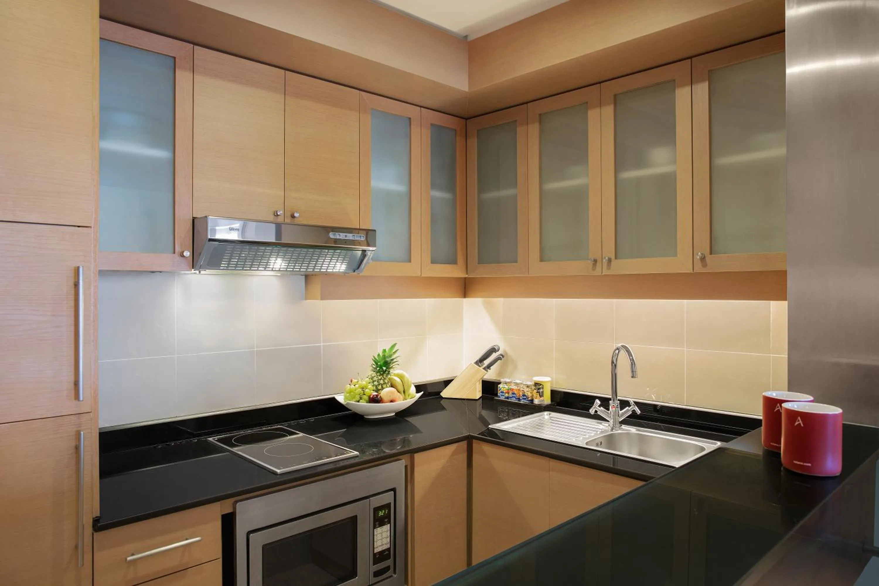 Kitchen or kitchenette in Nour Arjaan by Rotana-Fujairah