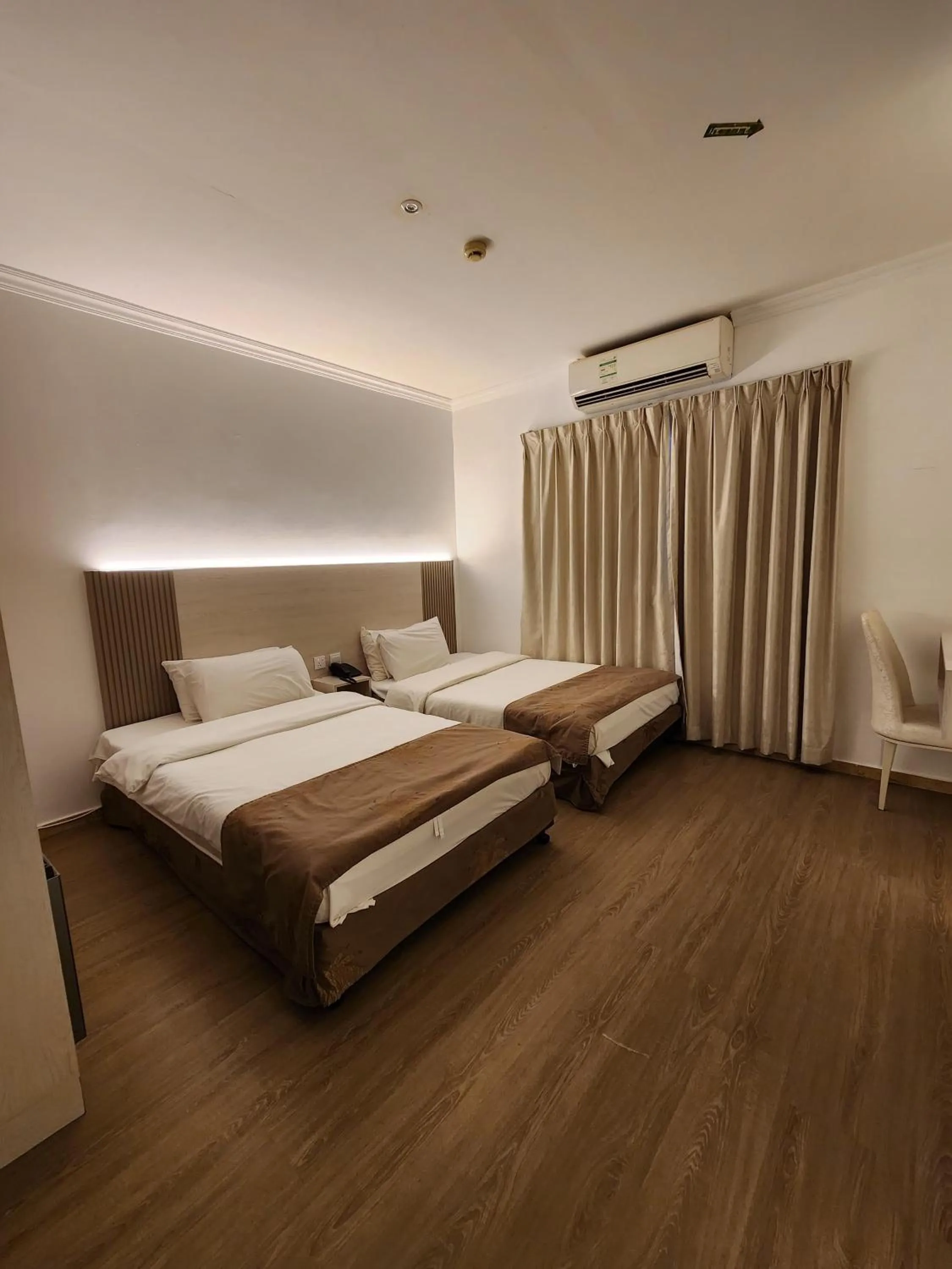 Bed in Sharjah International Airport Hotel