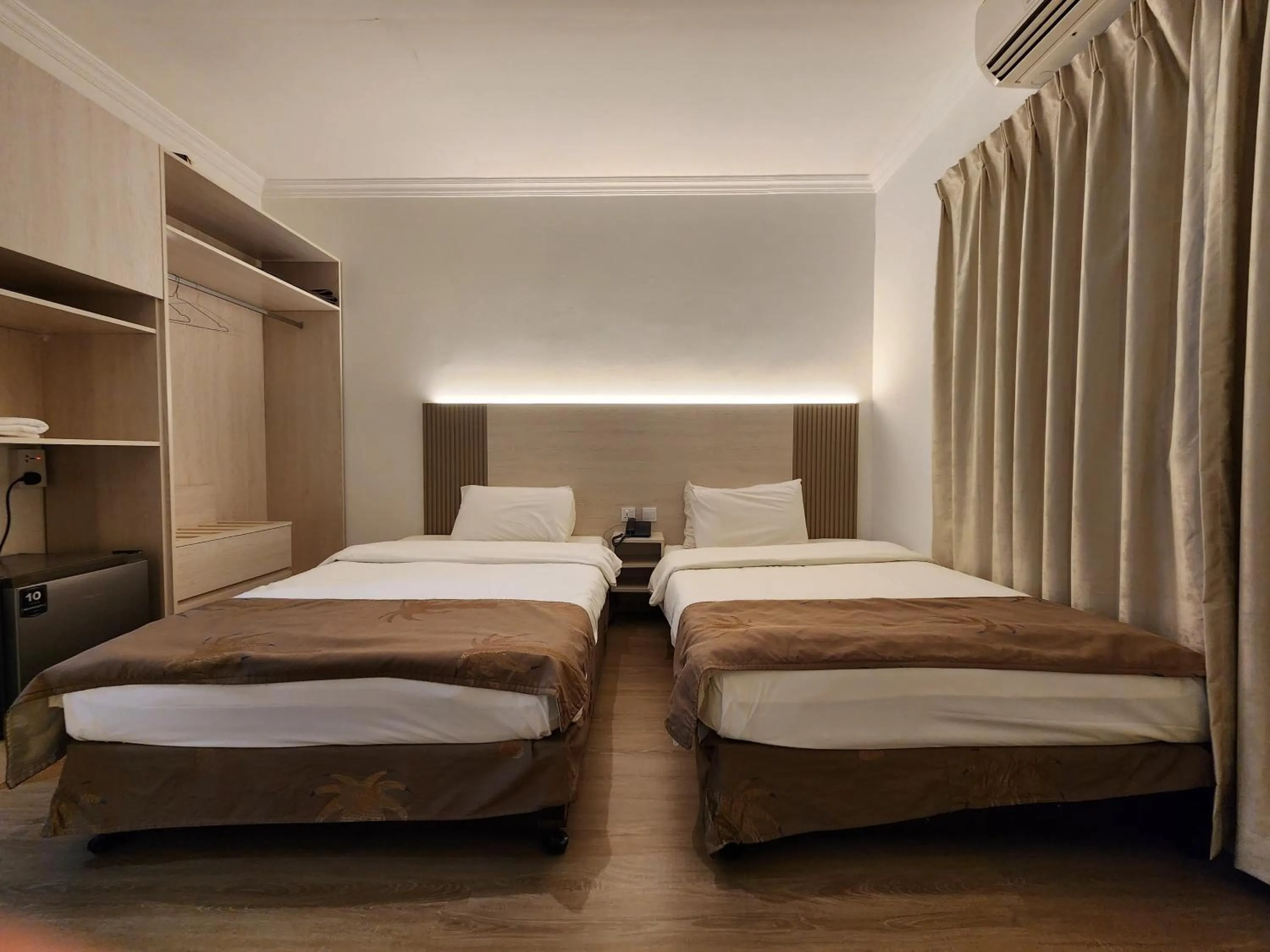 Bed in Sharjah International Airport Hotel