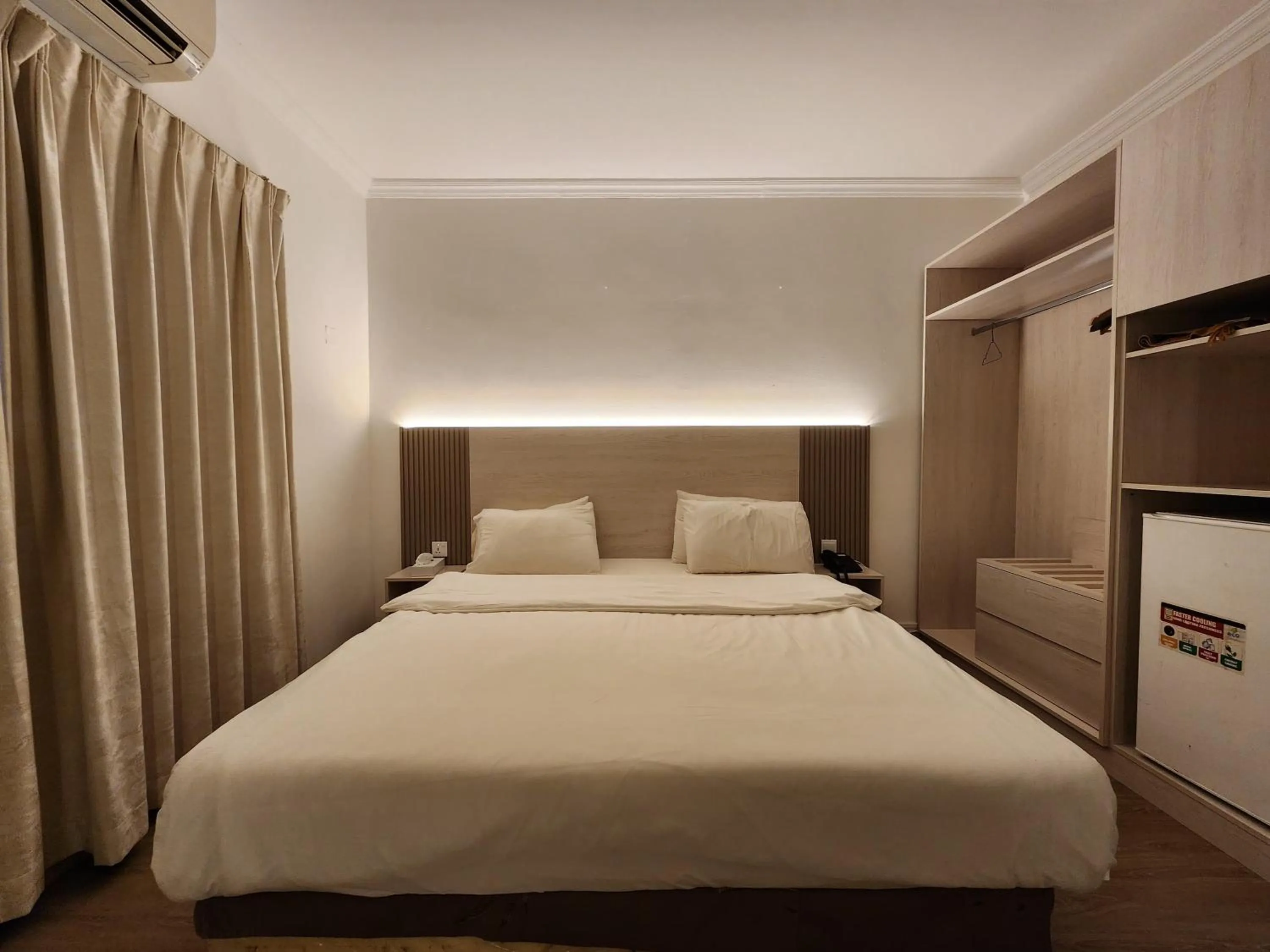 Bed in Sharjah International Airport Hotel