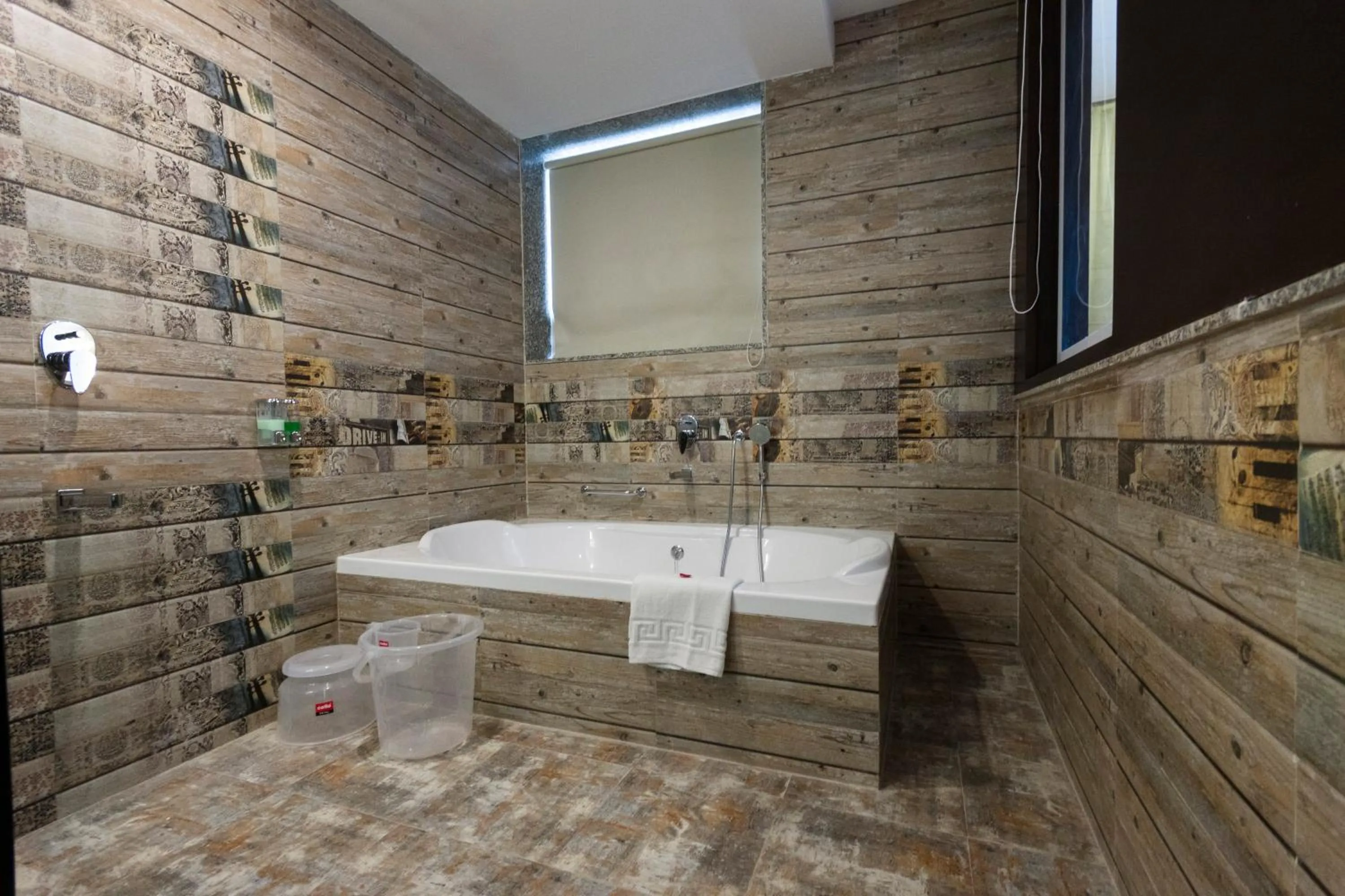 Bathroom in Hotel Udai Median