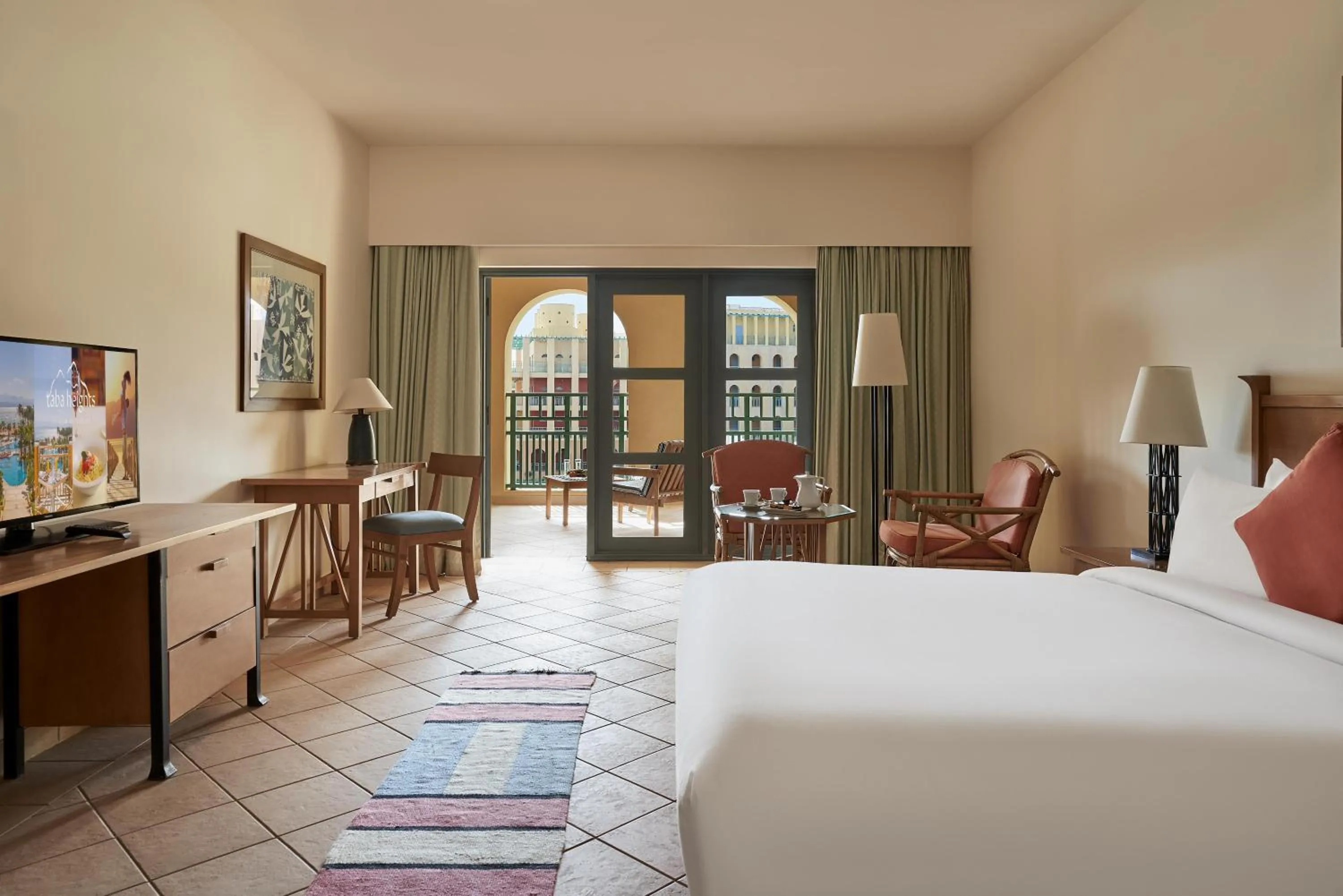 View (from property/room), Bed in Strand Beach Resort