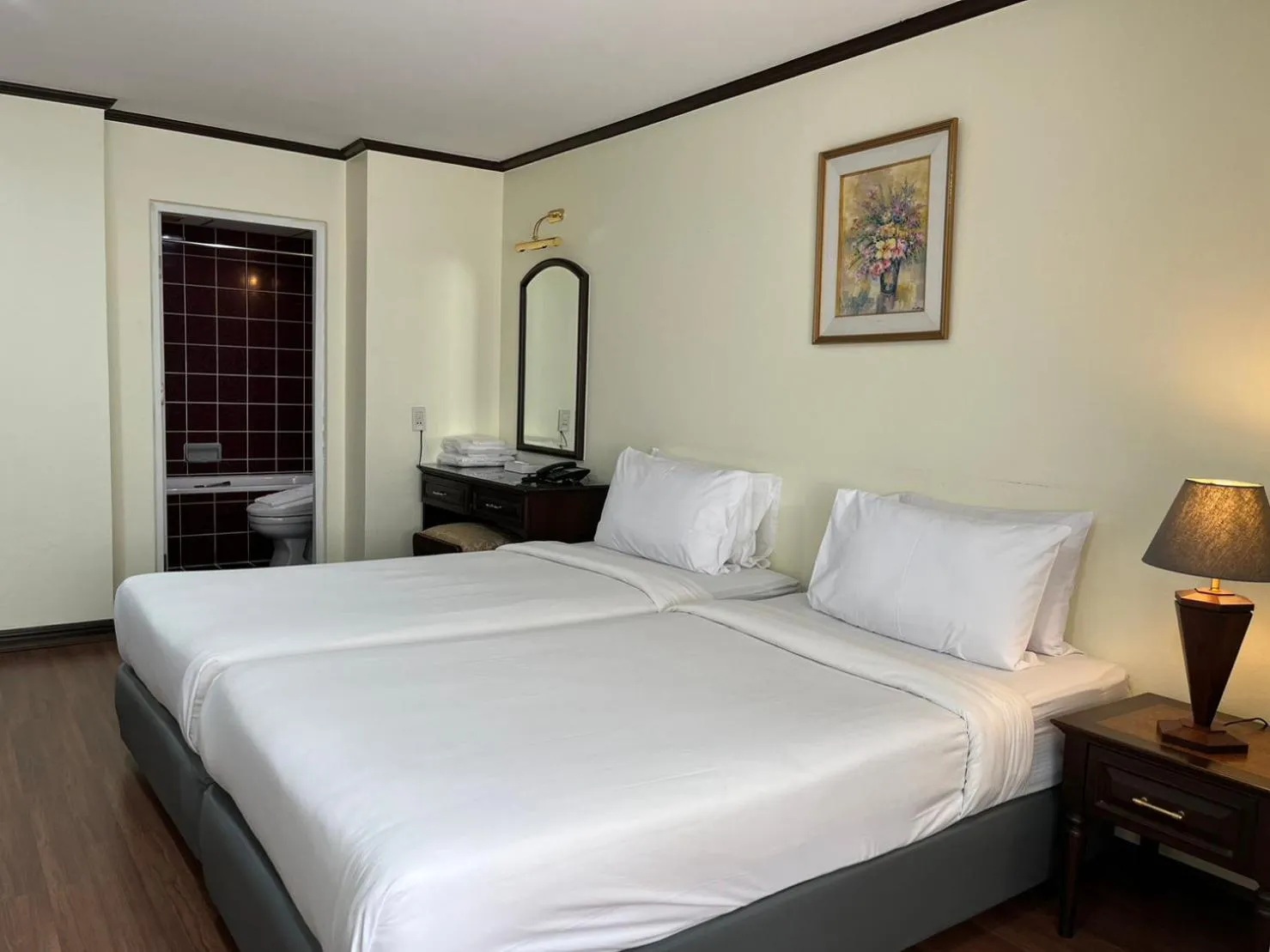 Bed in Yellow Ribbon Hills Boutique Suites