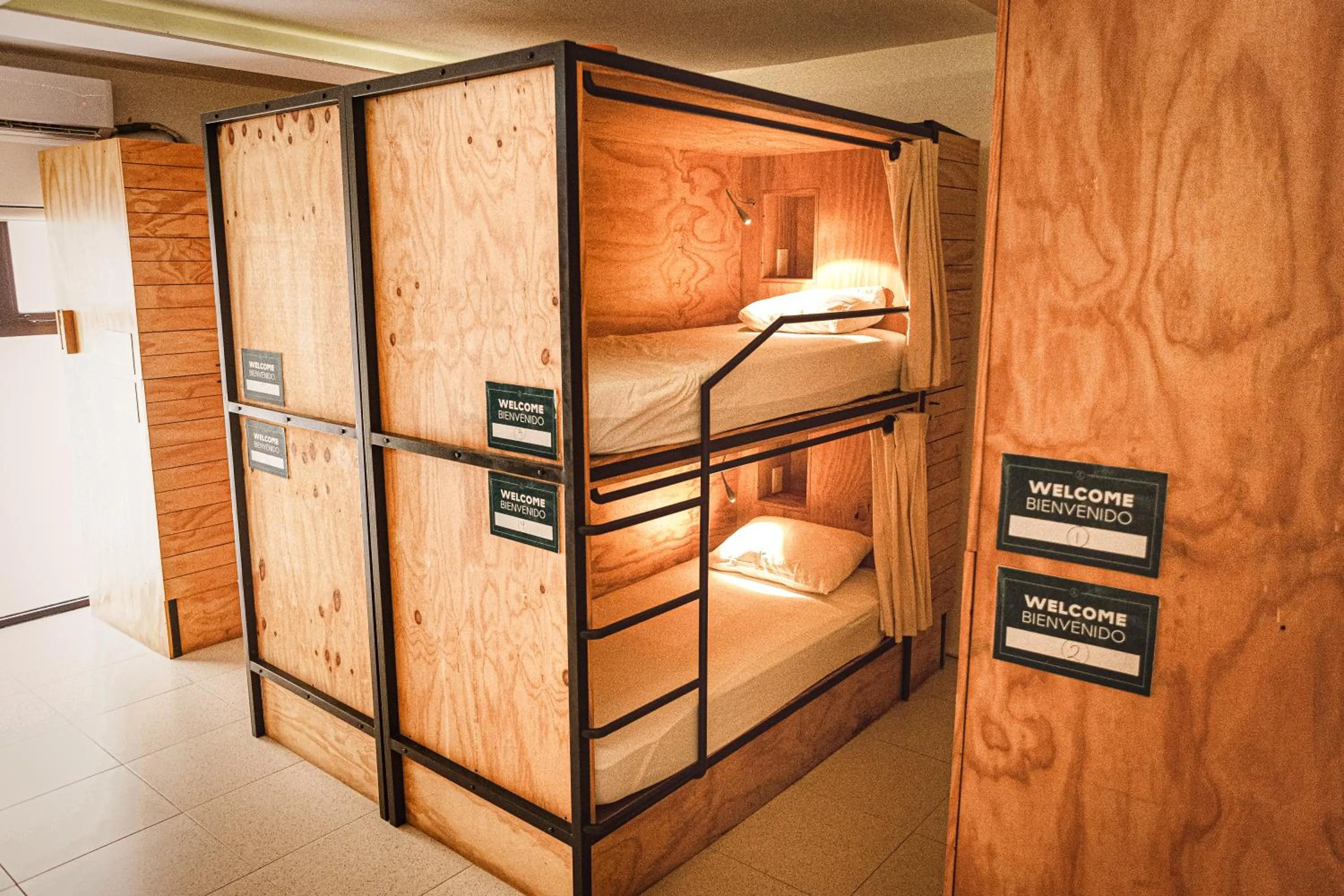 Bed in Nomads Hotel & Rooftop Pool Cancun