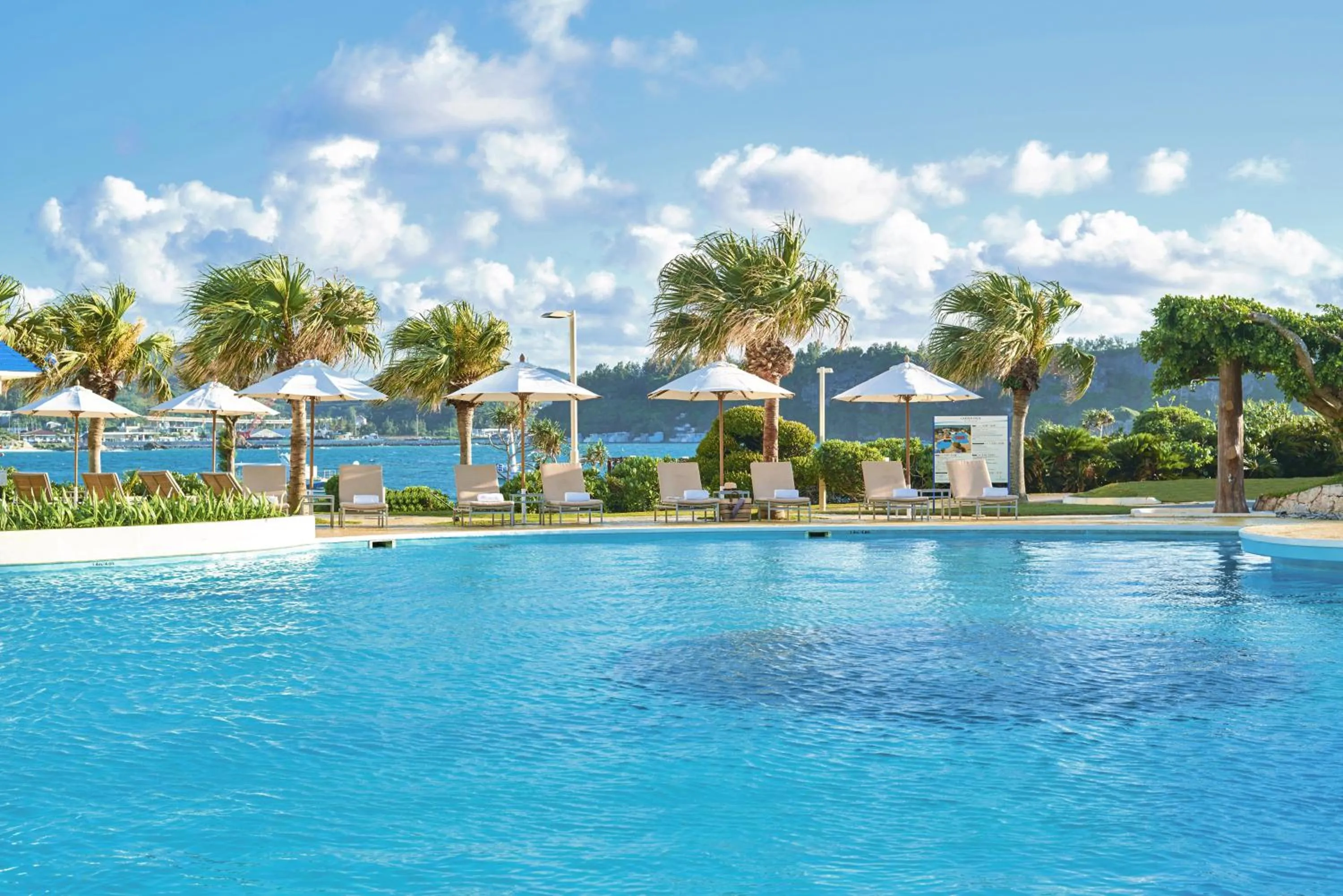 Swimming pool in ANA InterContinental Manza Beach Resort by IHG