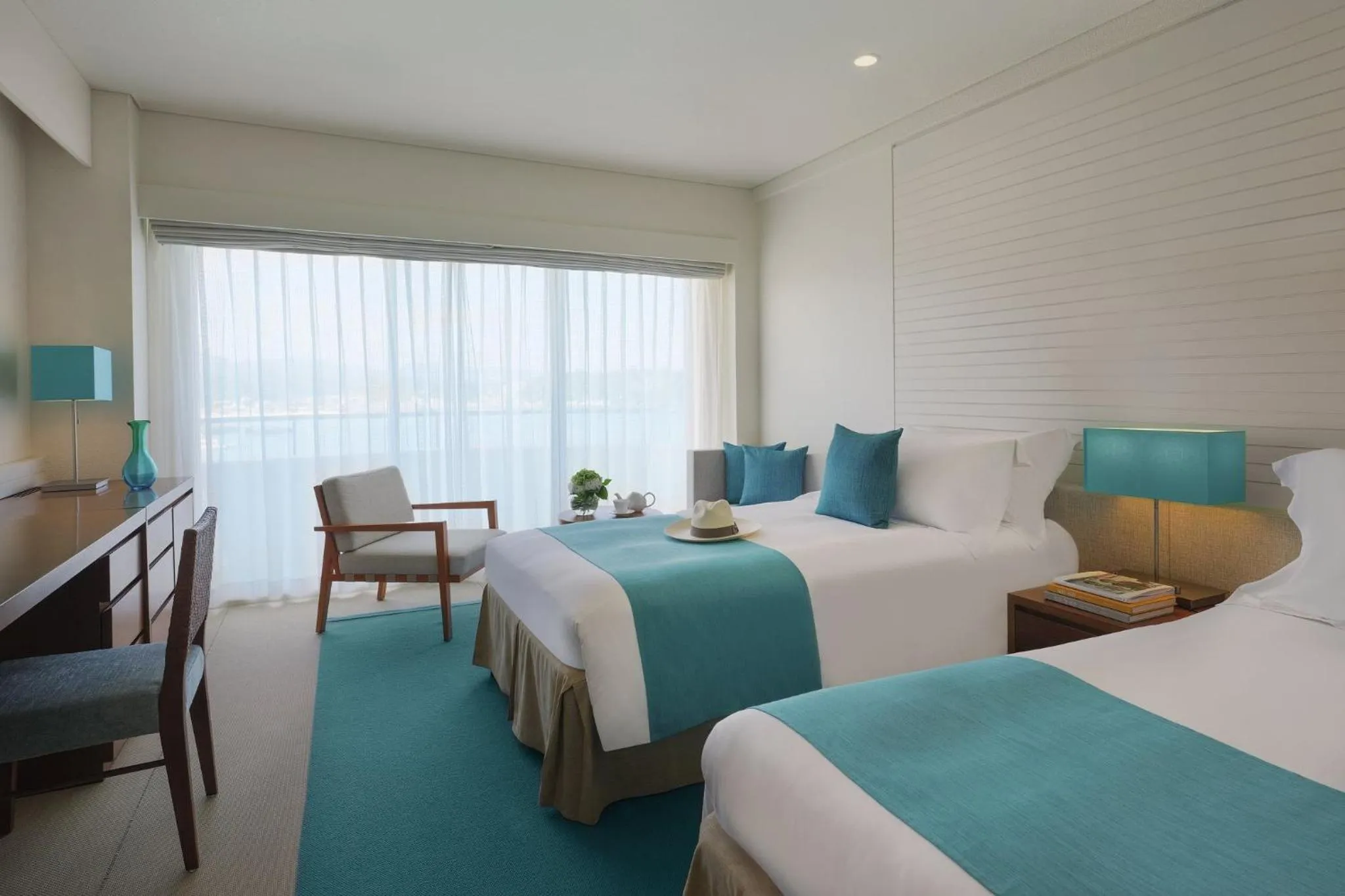 Photo of the whole room, Bed in ANA InterContinental Manza Beach Resort by IHG