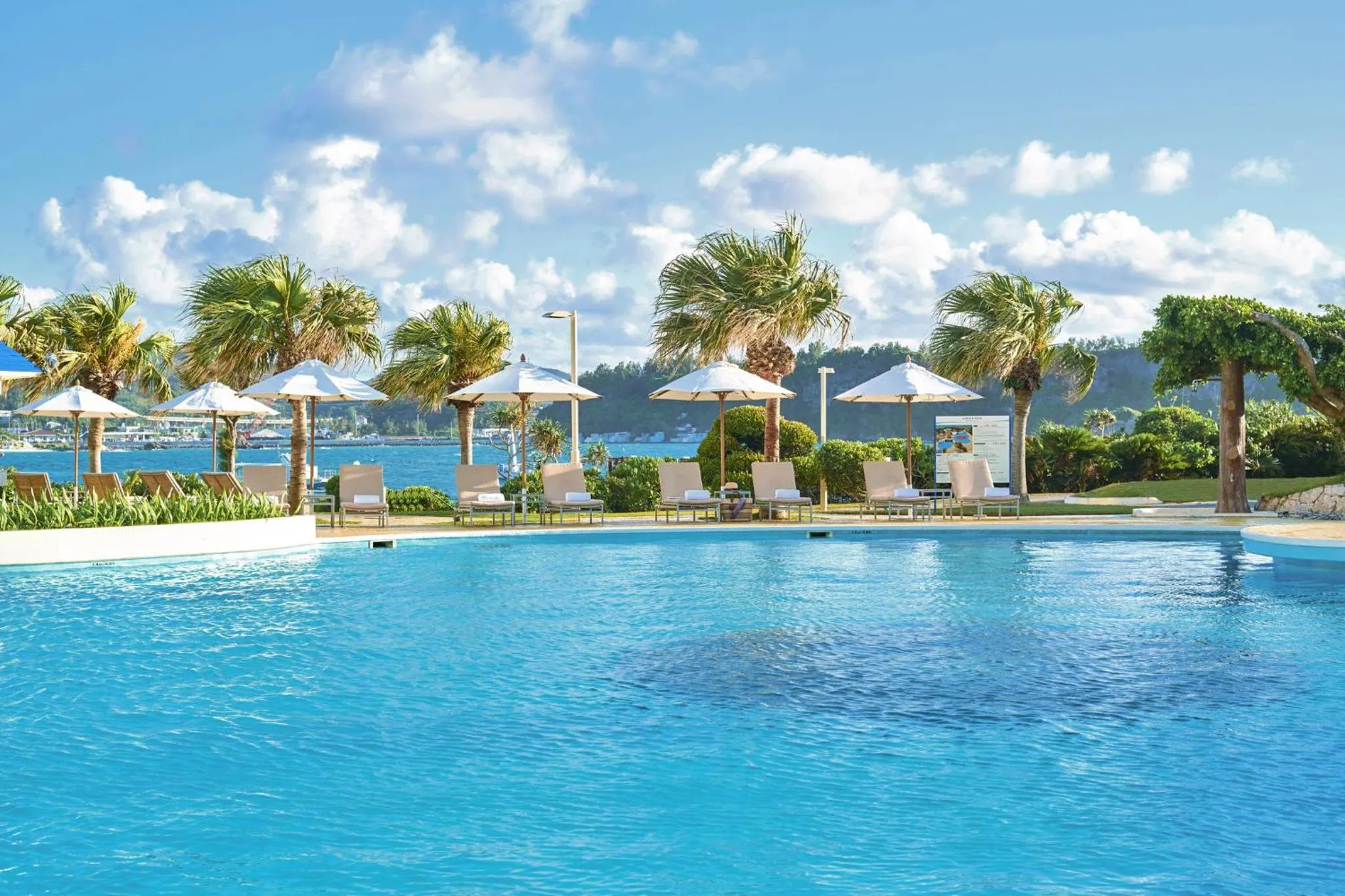 Swimming pool in ANA InterContinental Manza Beach Resort by IHG