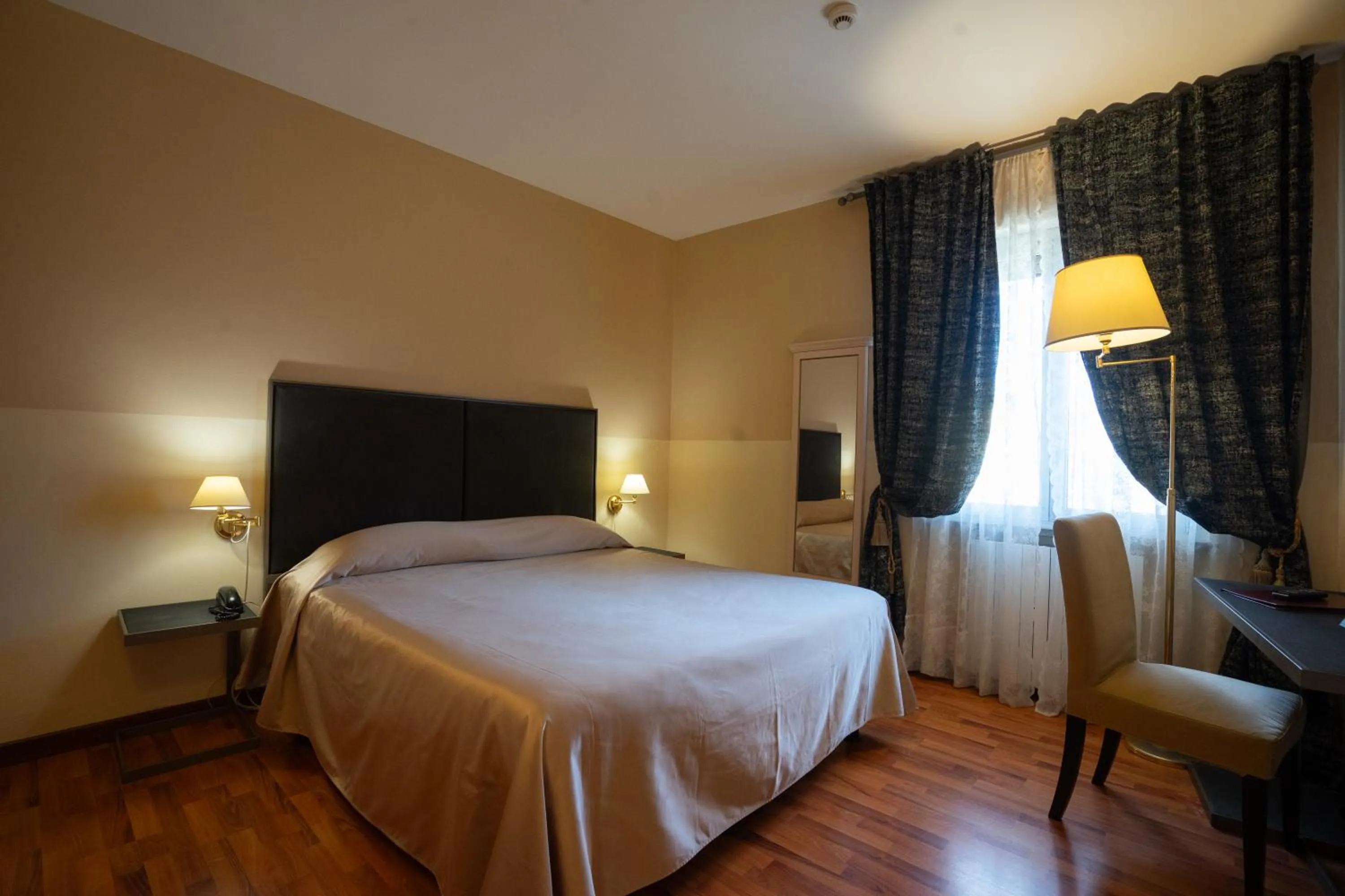 Bed in Hotel Bernardino