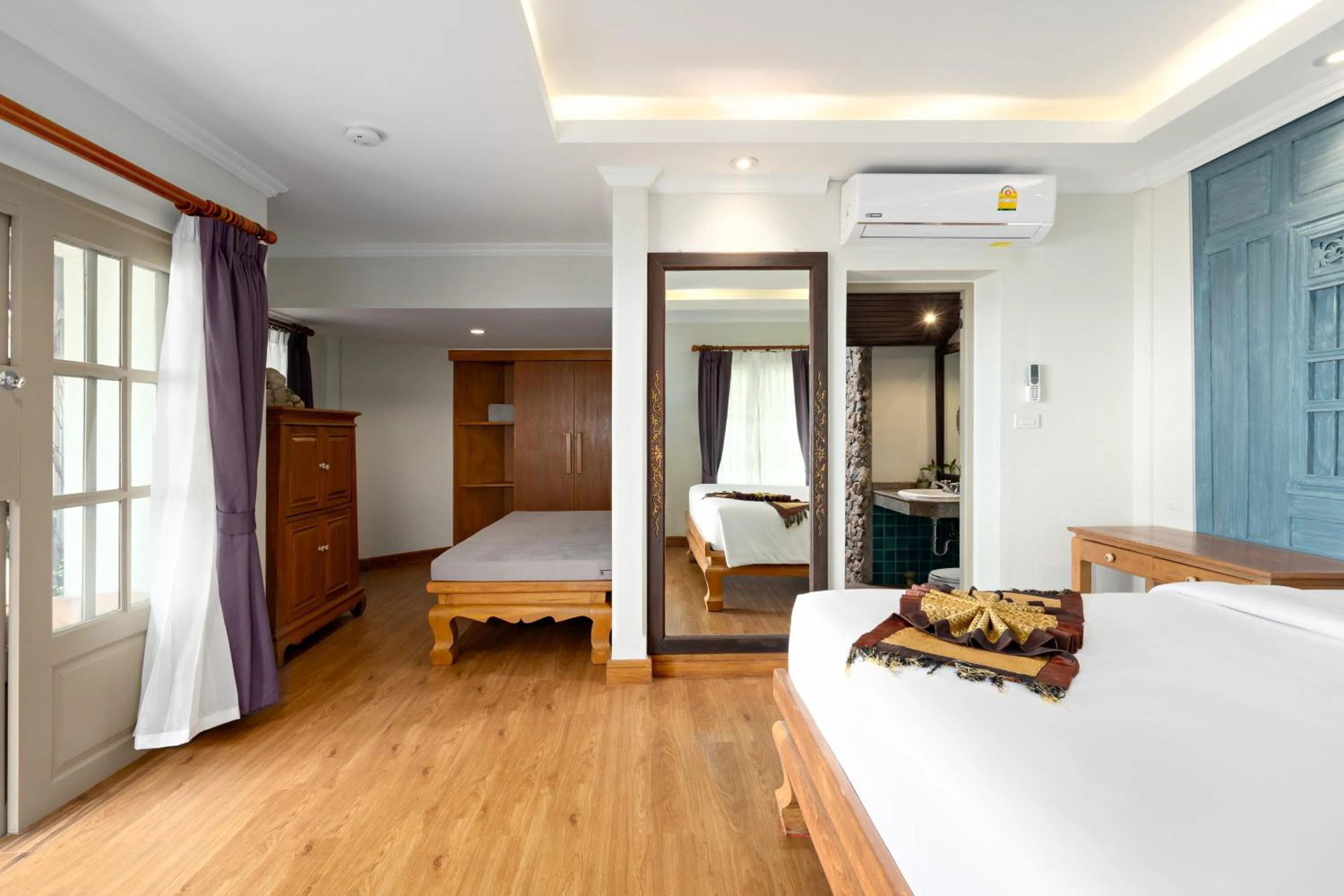 Living room, Bed in The Fair House Beach Resort & Hotel