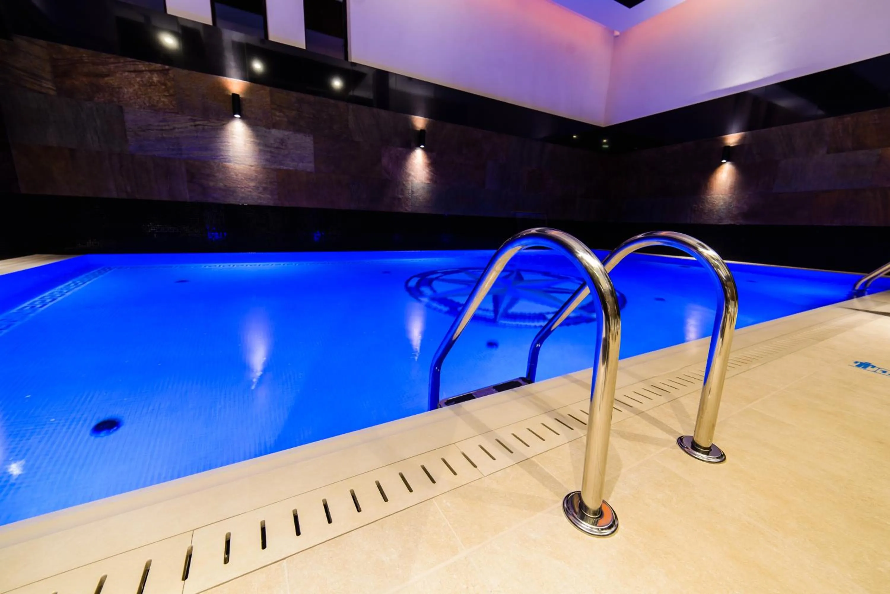 Swimming pool in Arena Hotel Spa & Wellness