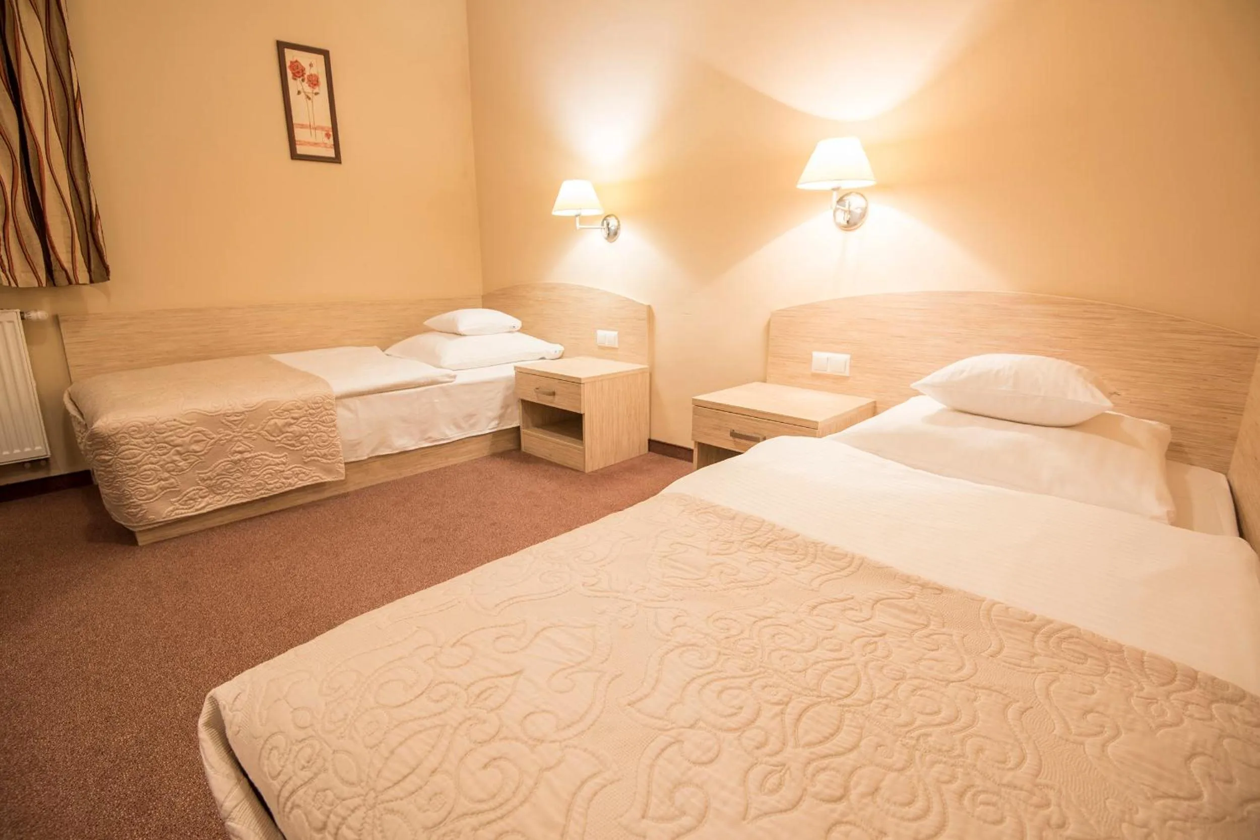 Bed in Arena Hotel Spa & Wellness