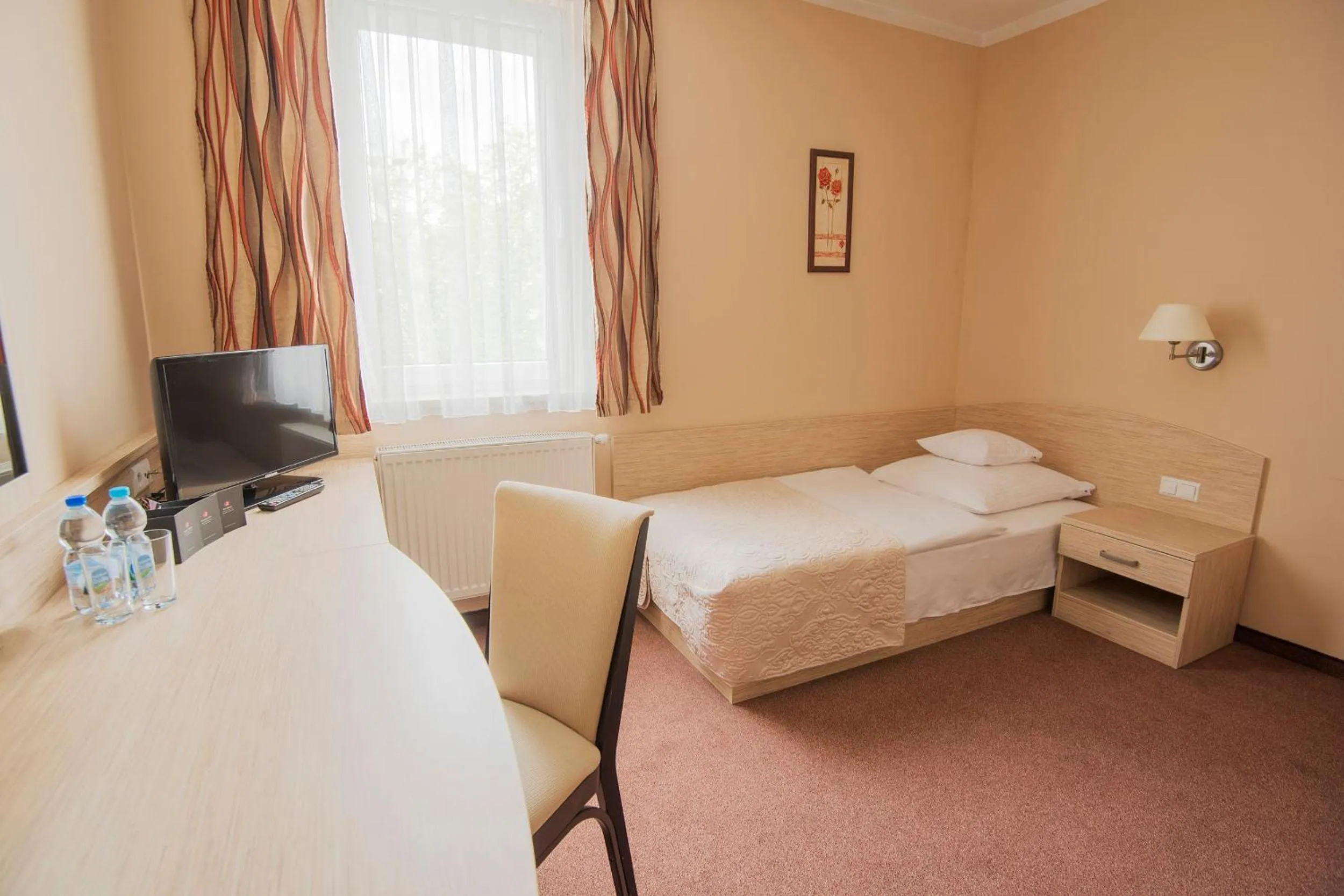 Bed in Arena Hotel Spa & Wellness