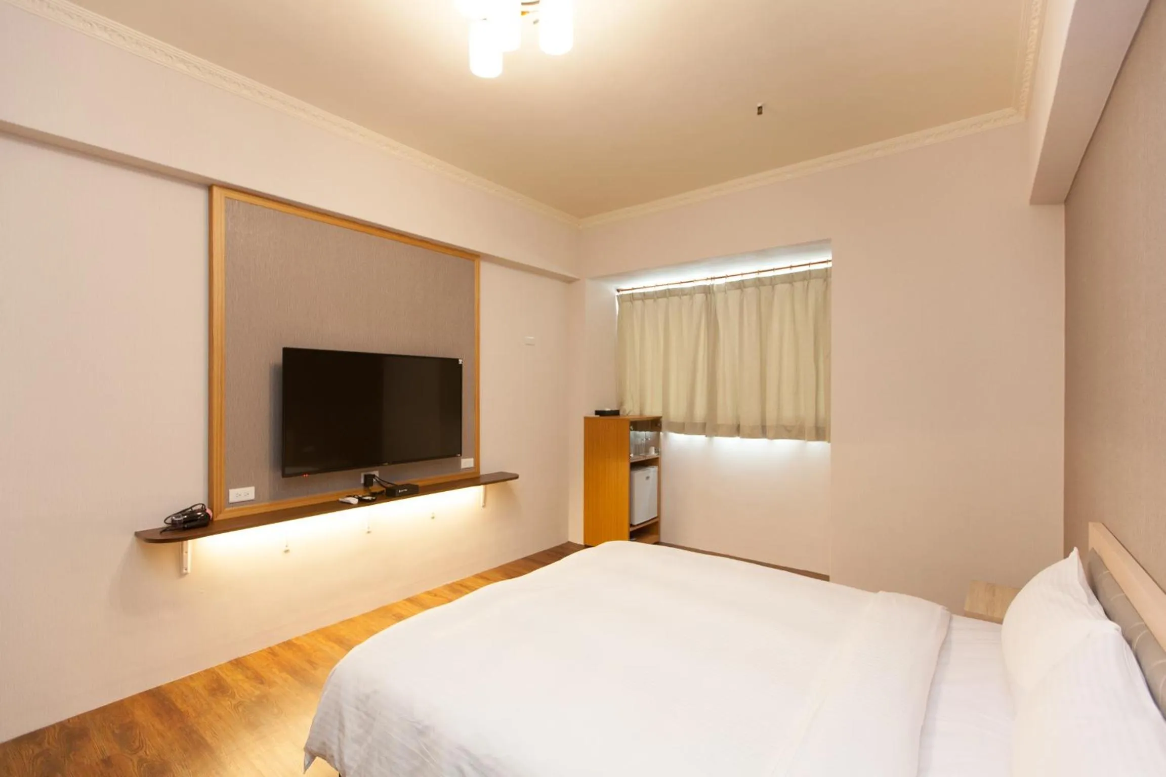 Bed in Huang Tai Hotel