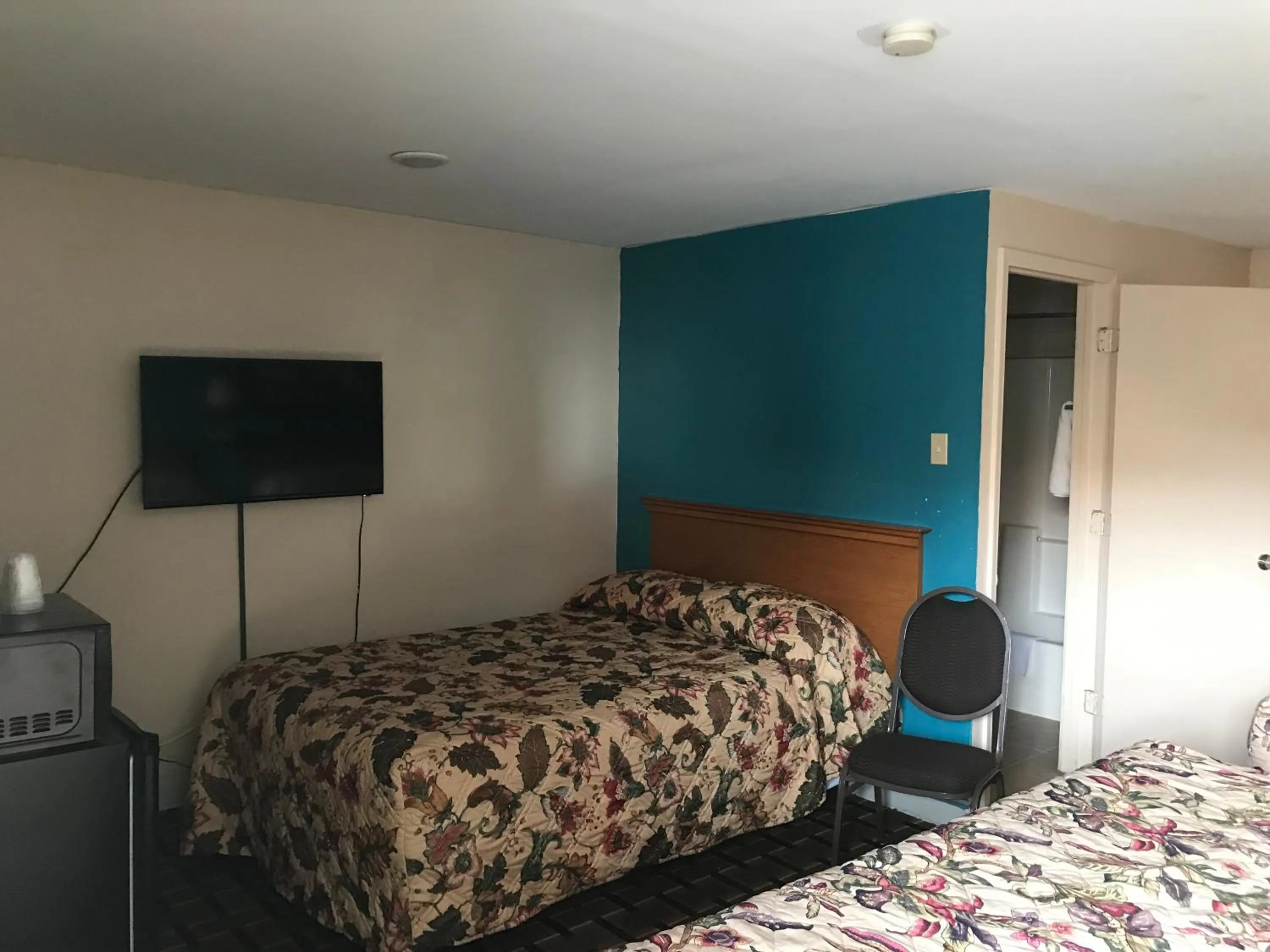 Bed in Blue Falls Motel