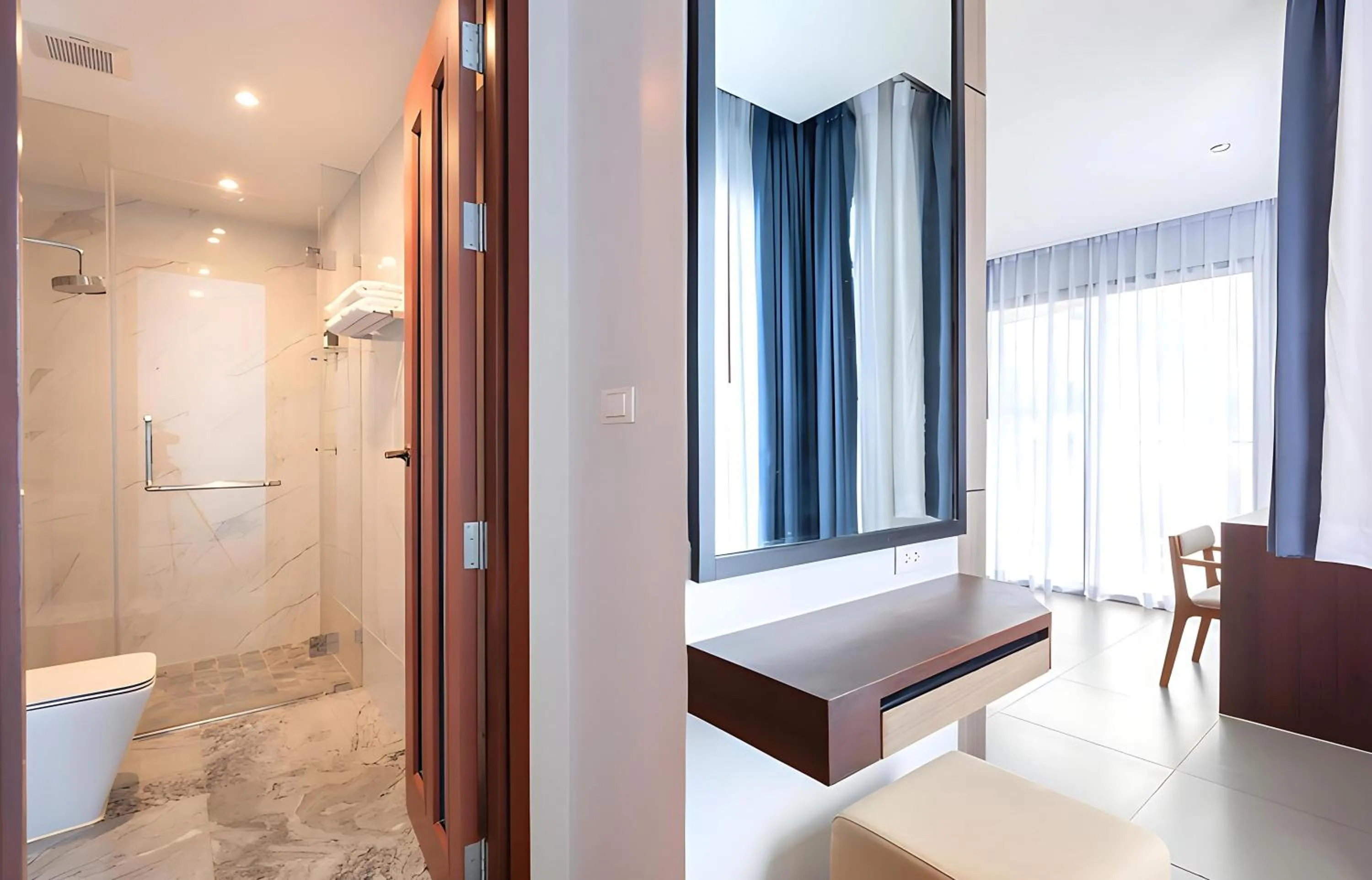 Photo of the whole room, Bed in The Marina Phuket Hotel