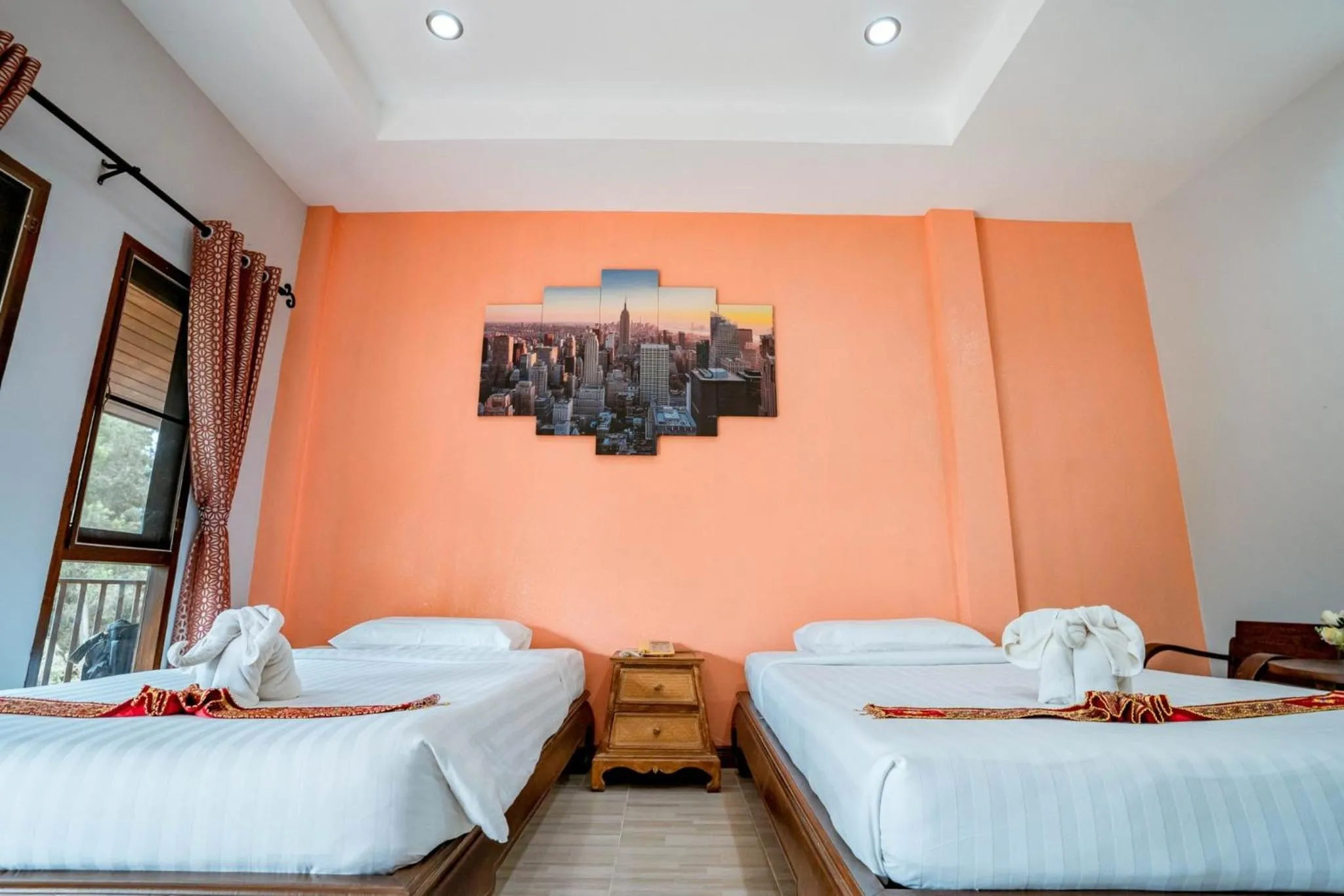 Bed in Kasalong Resort and Spa Pattaya