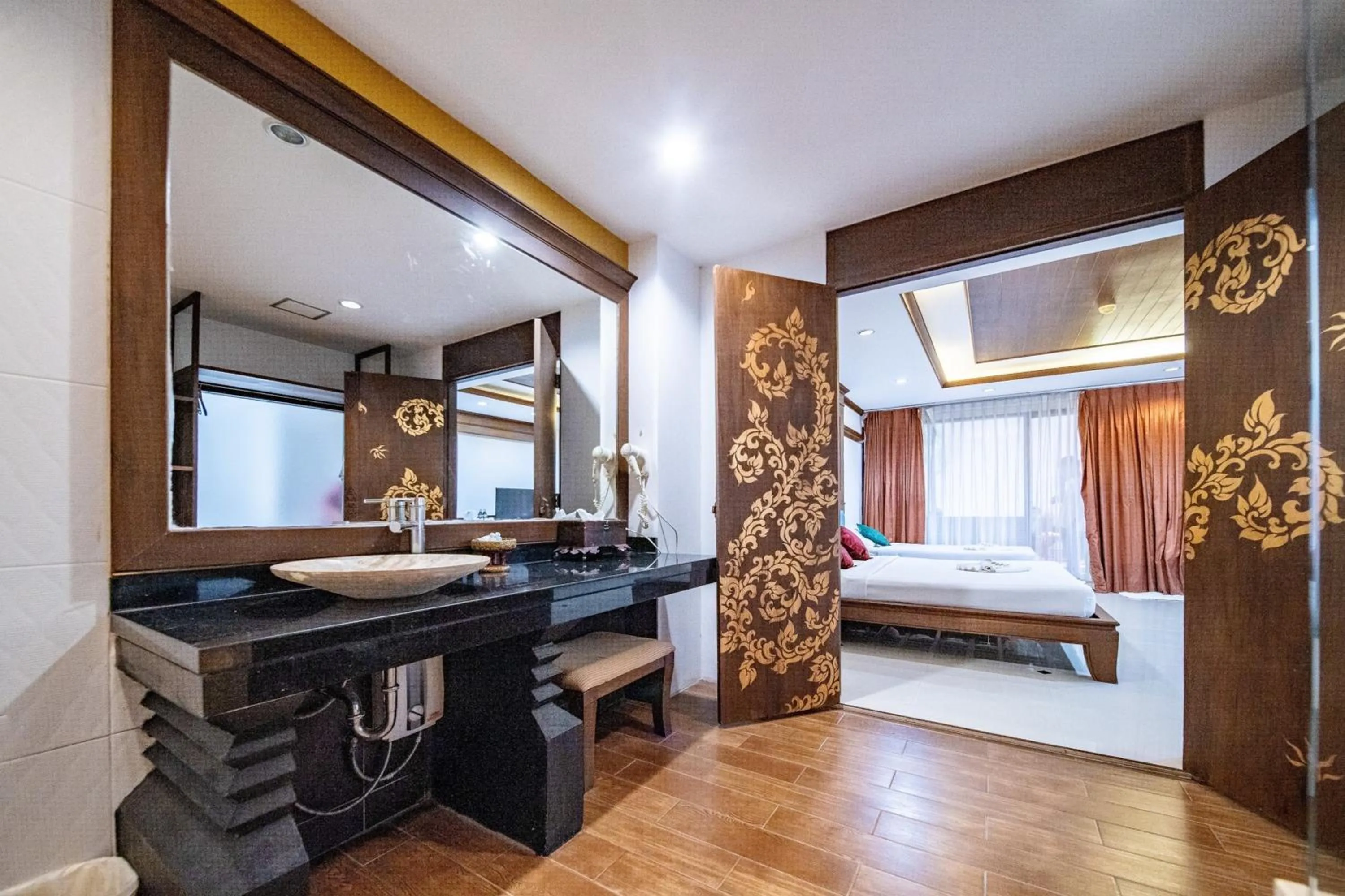 Bathroom, Bed in Kasalong Resort and Spa Pattaya