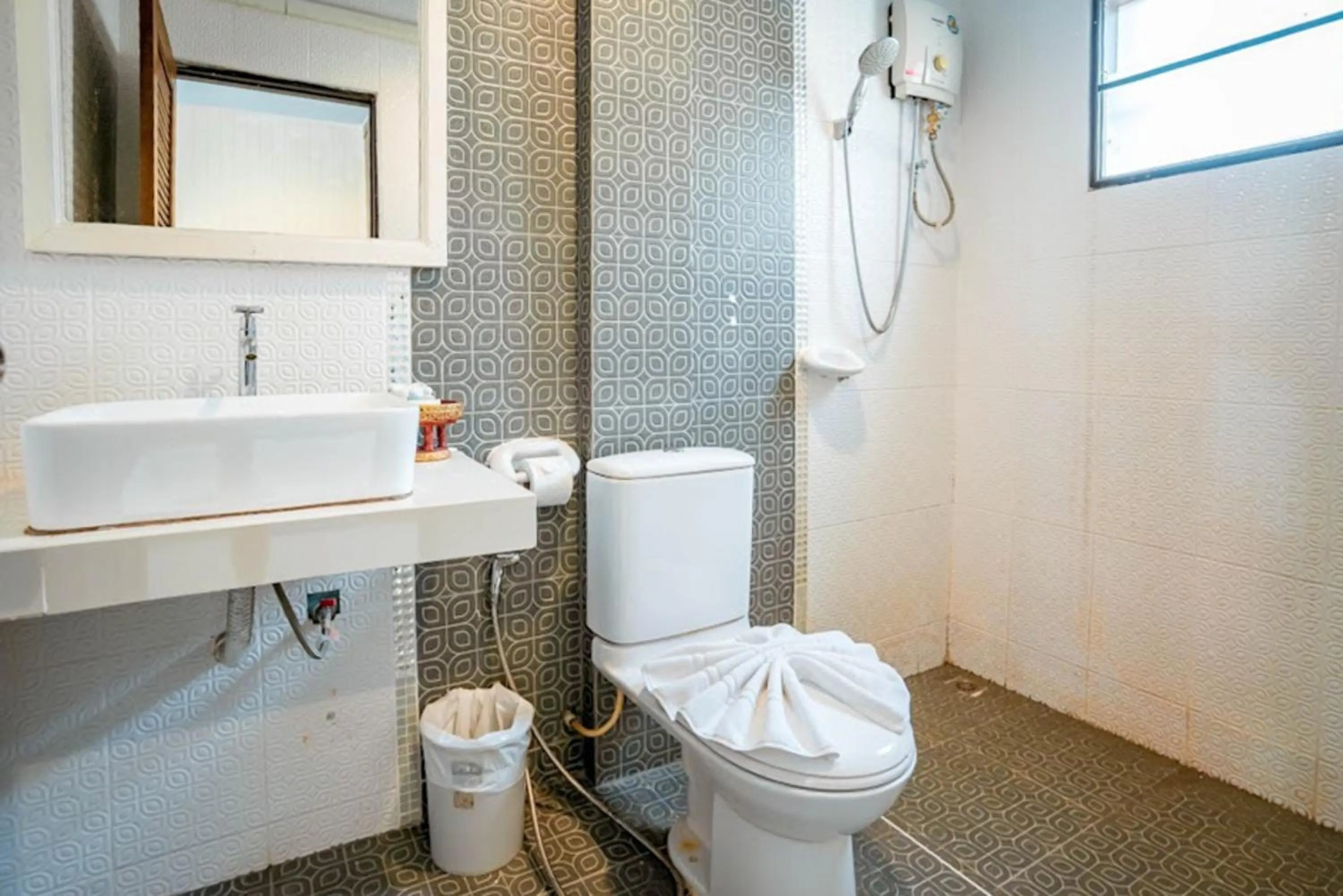 Shower in Kasalong Resort and Spa Pattaya