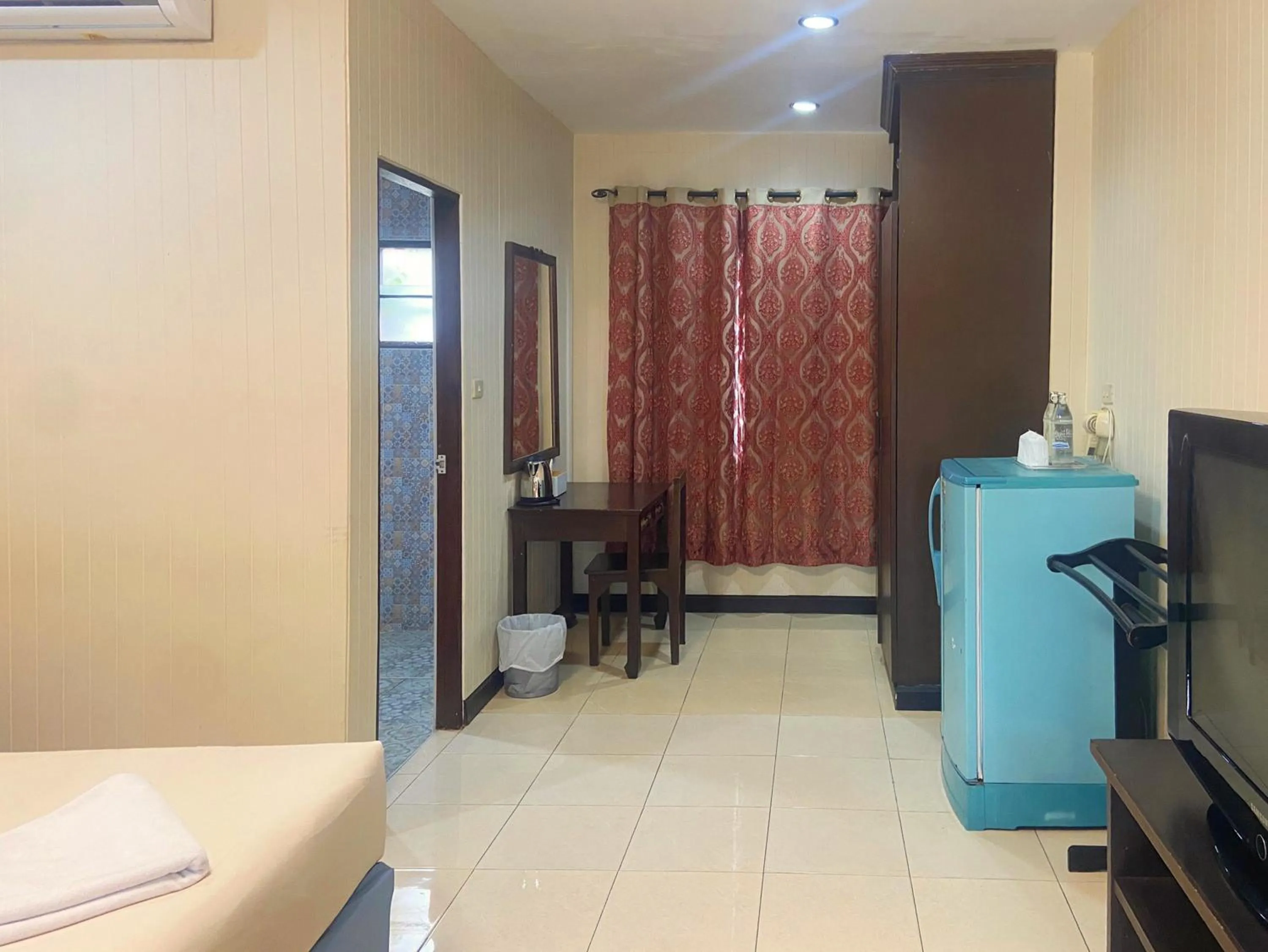 Bed in Kasalong Resort and Spa Pattaya