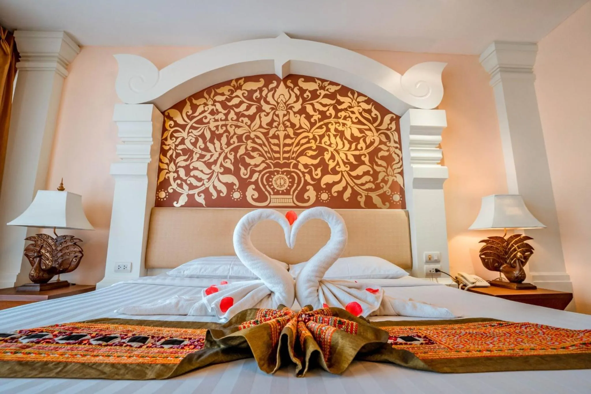 Bed in Kasalong Resort and Spa Pattaya