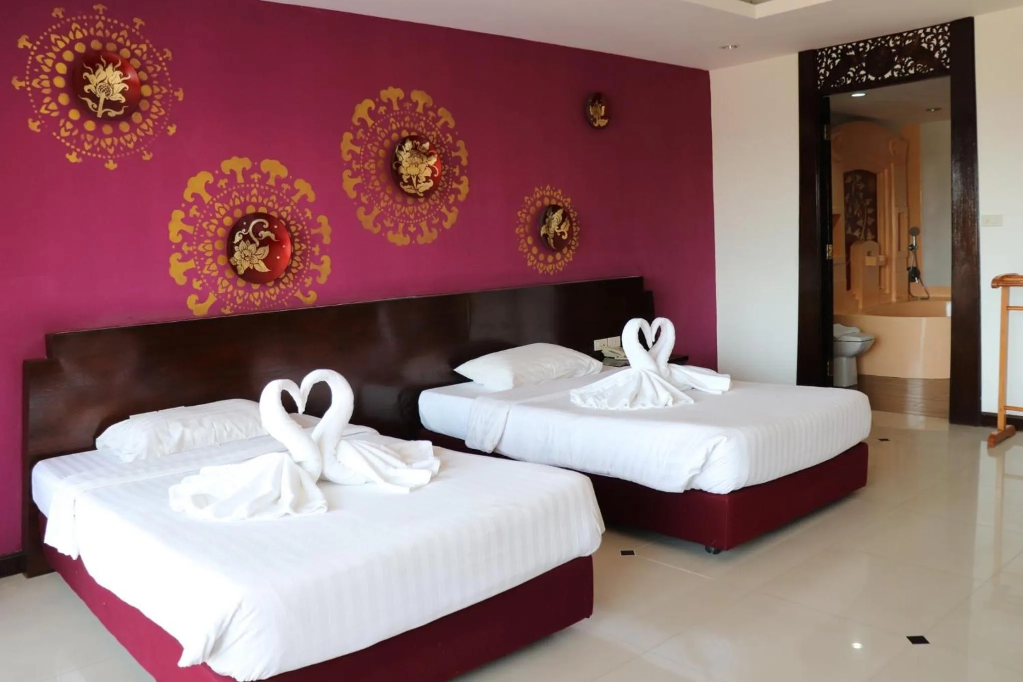 Bed in Kasalong Resort and Spa Pattaya