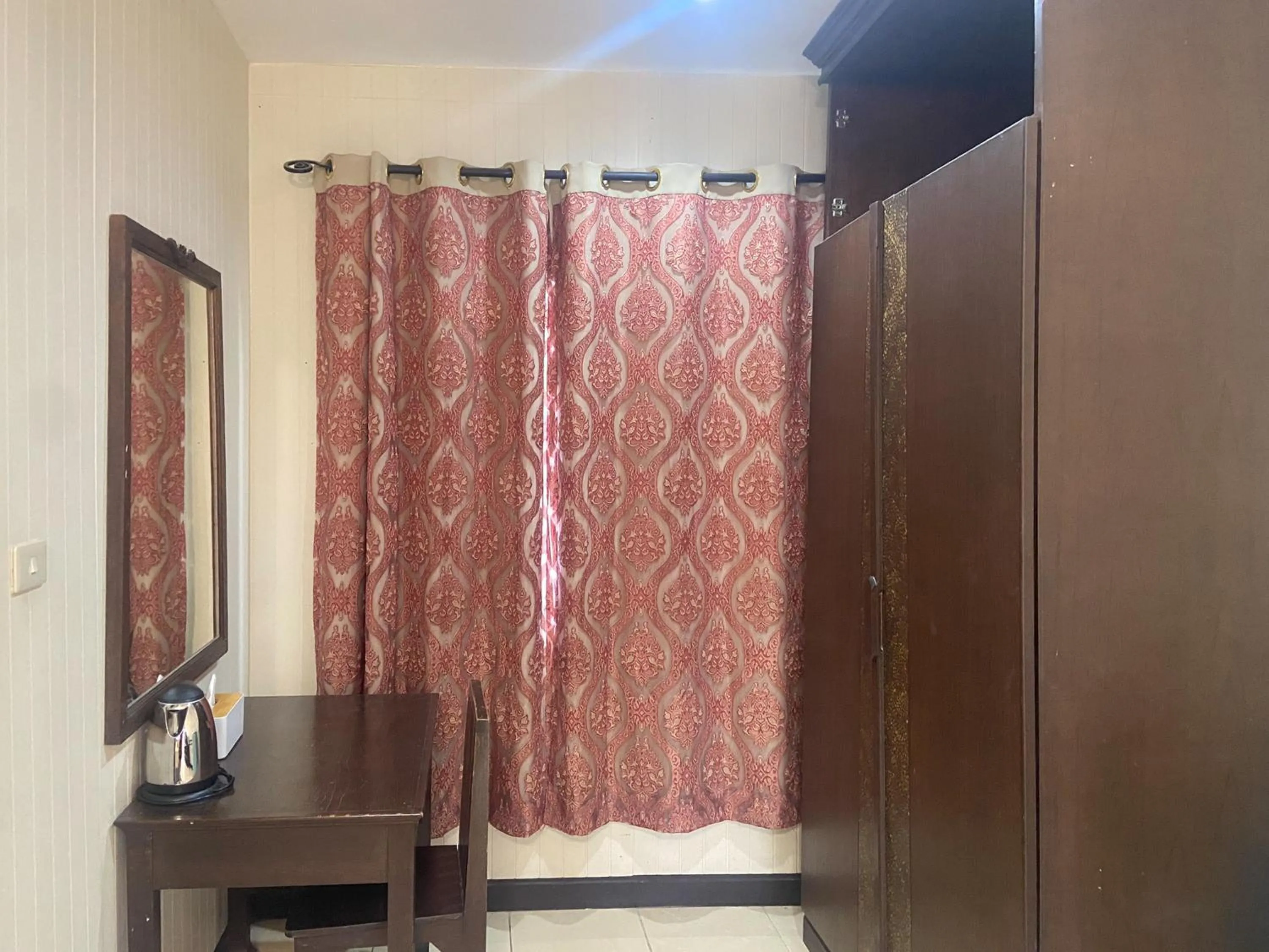 wardrobe in Kasalong Resort and Spa Pattaya