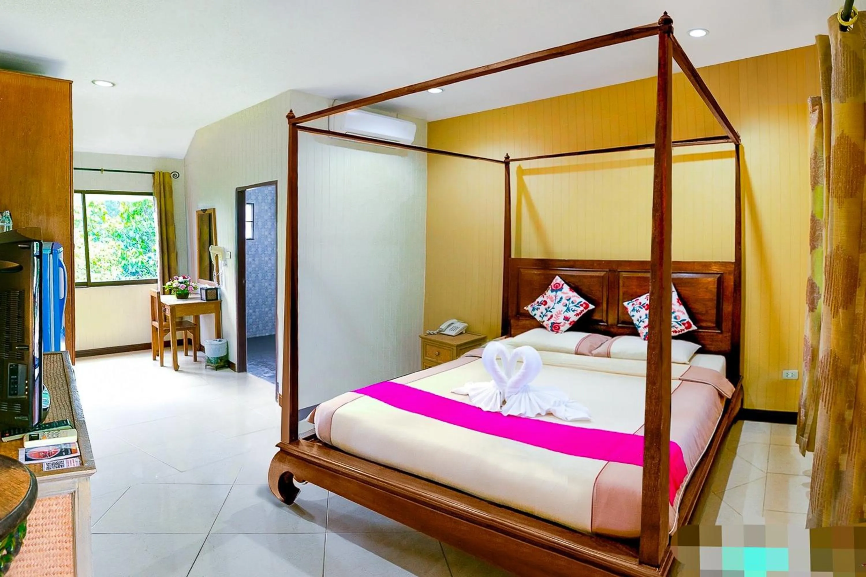 Bed in Kasalong Resort and Spa Pattaya
