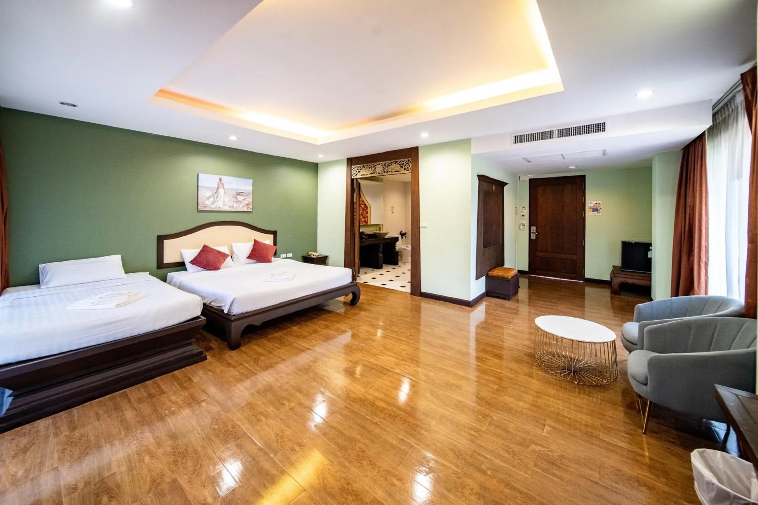 Bed in Kasalong Resort and Spa Pattaya