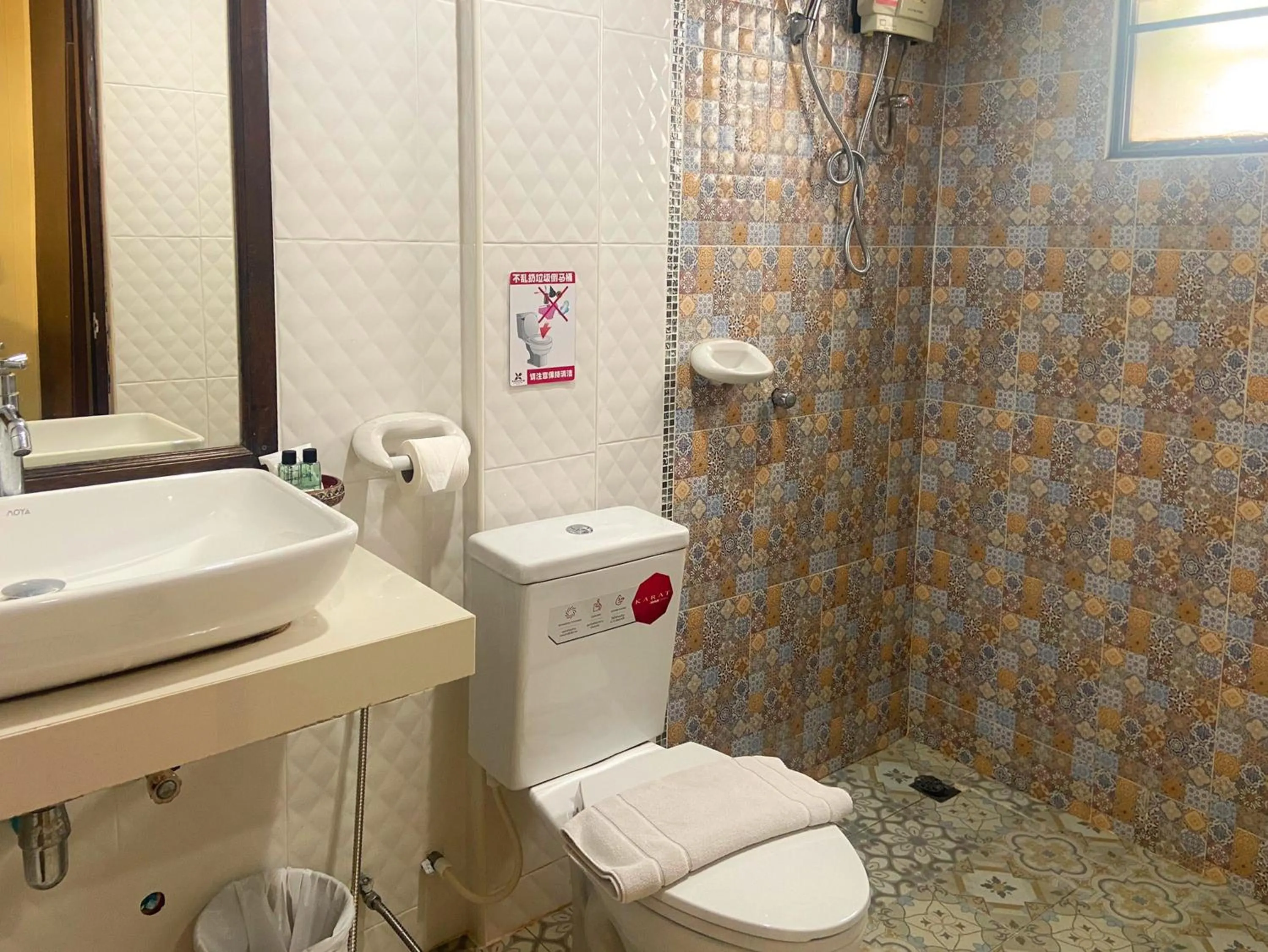 Shower in Kasalong Resort and Spa Pattaya