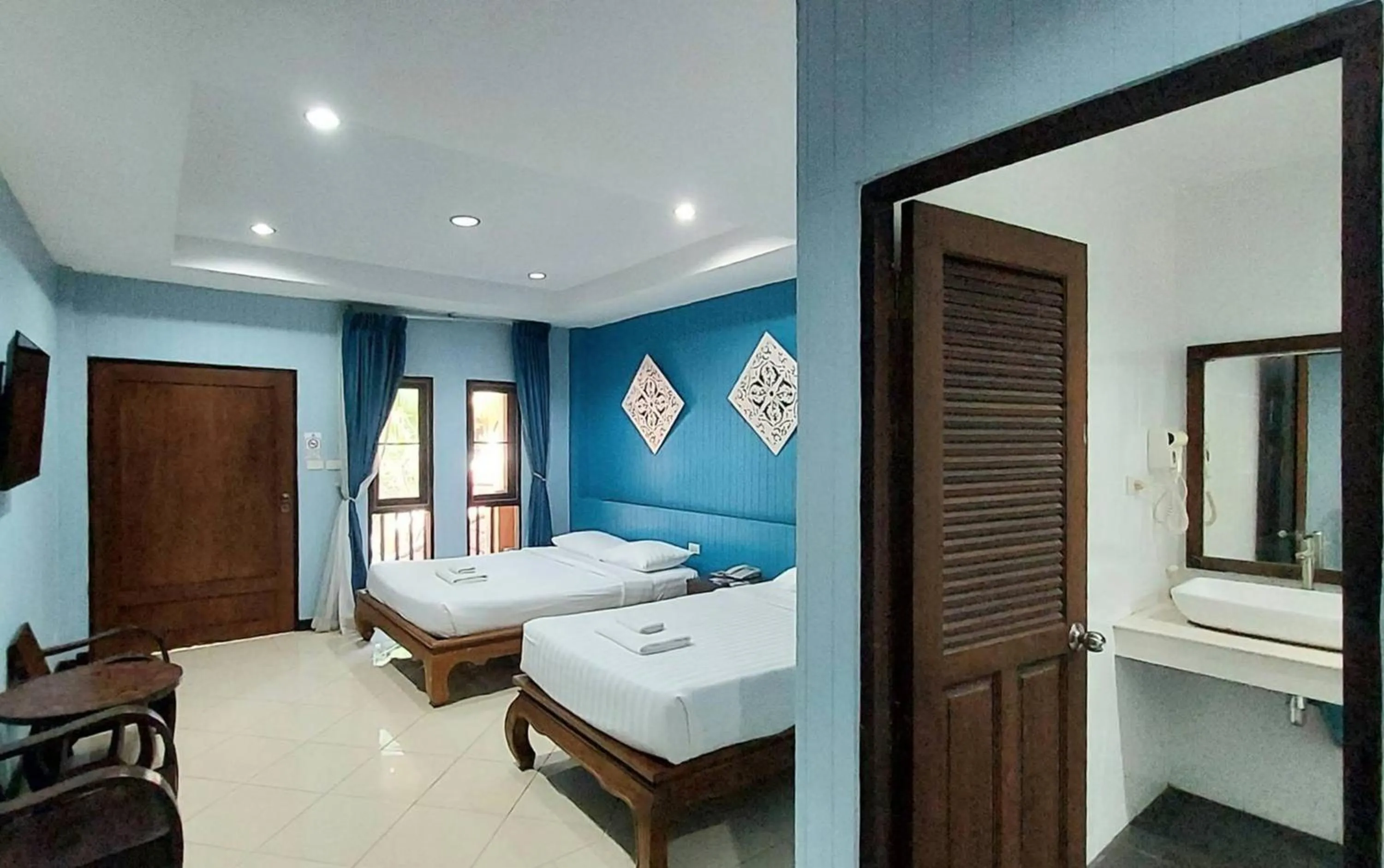 Bed in Kasalong Resort and Spa Pattaya