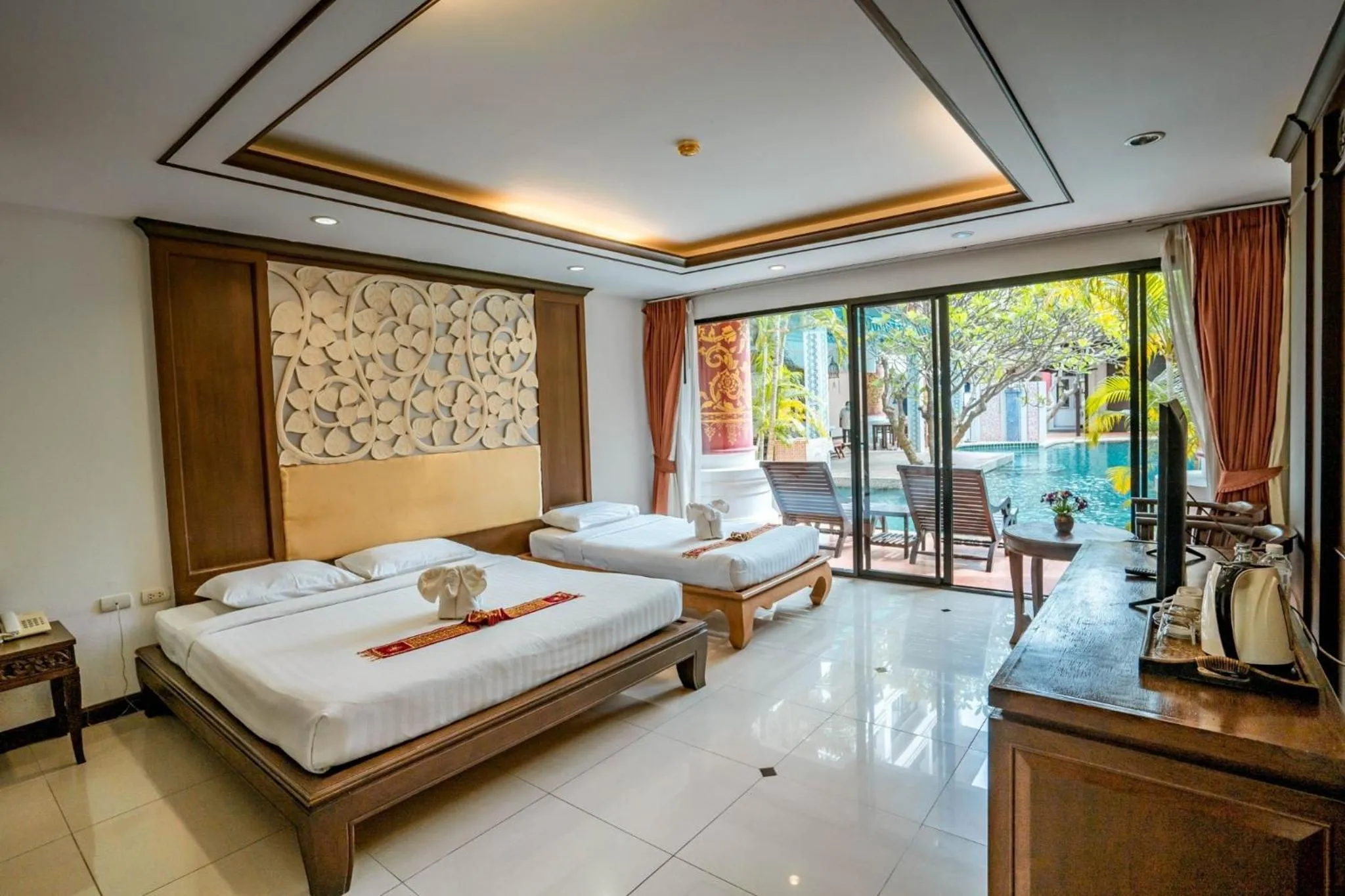 Bed in Kasalong Resort and Spa Pattaya