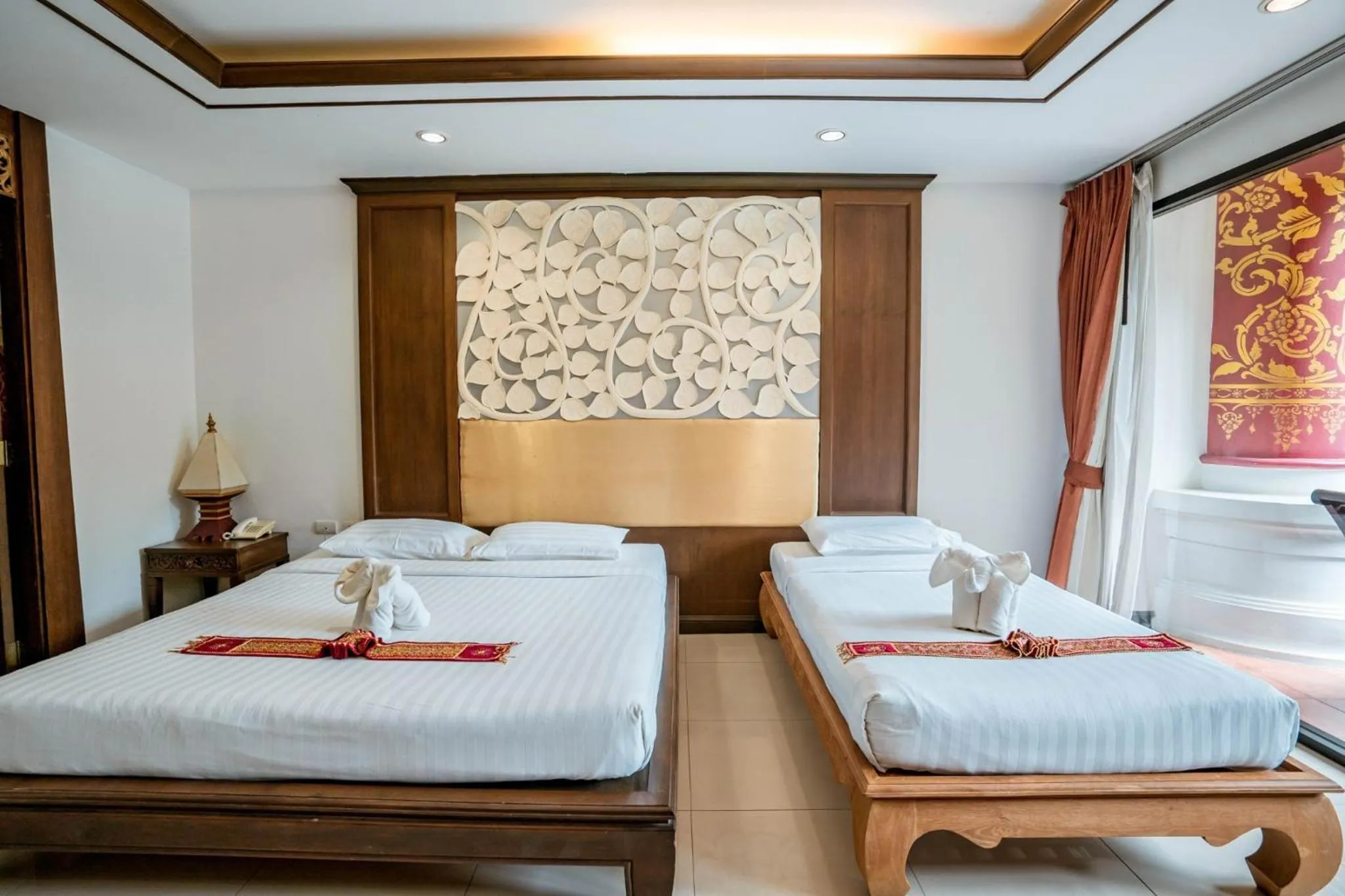 Bed in Kasalong Resort and Spa Pattaya